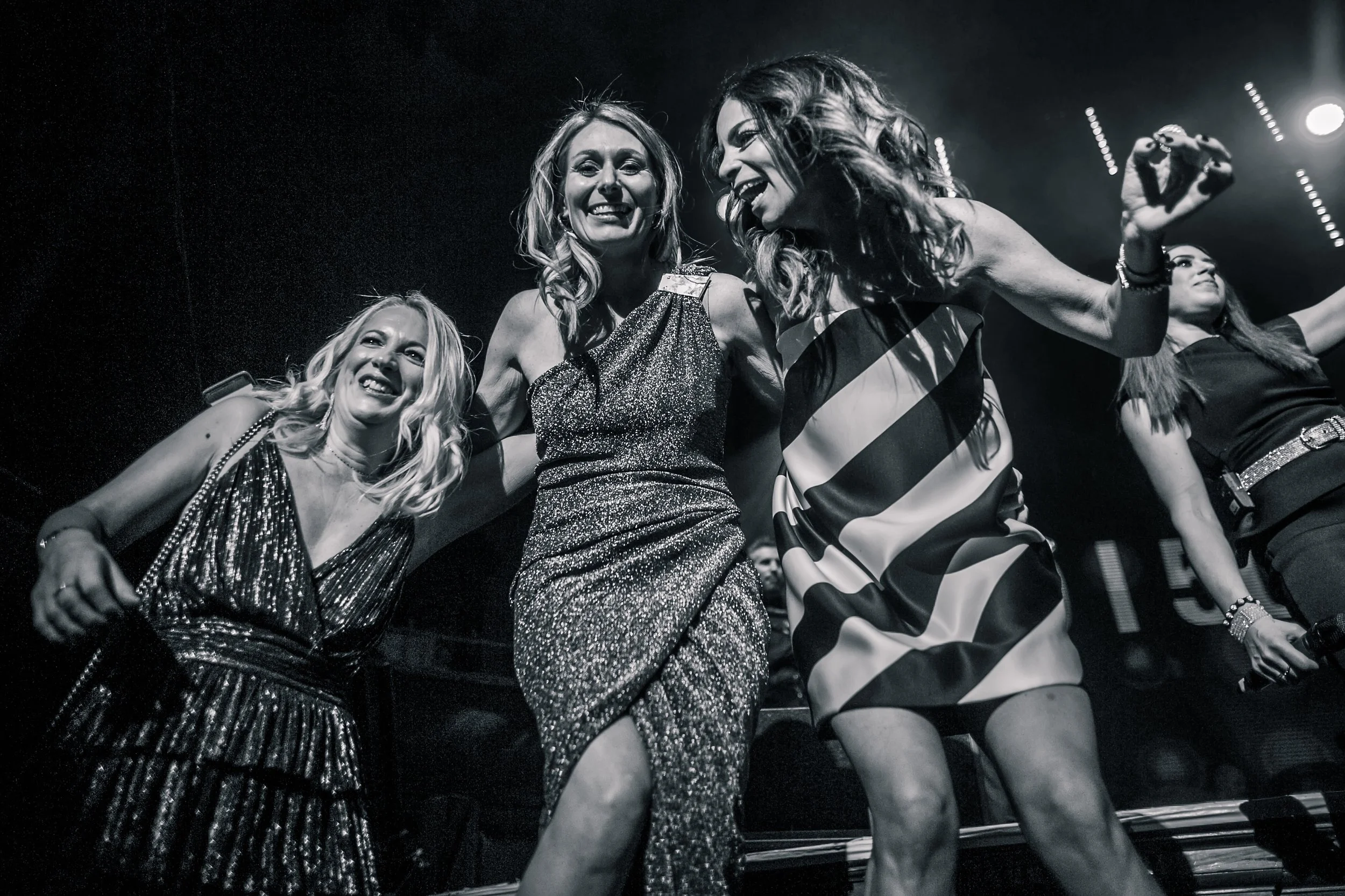 birthday girl and friends dancing during party