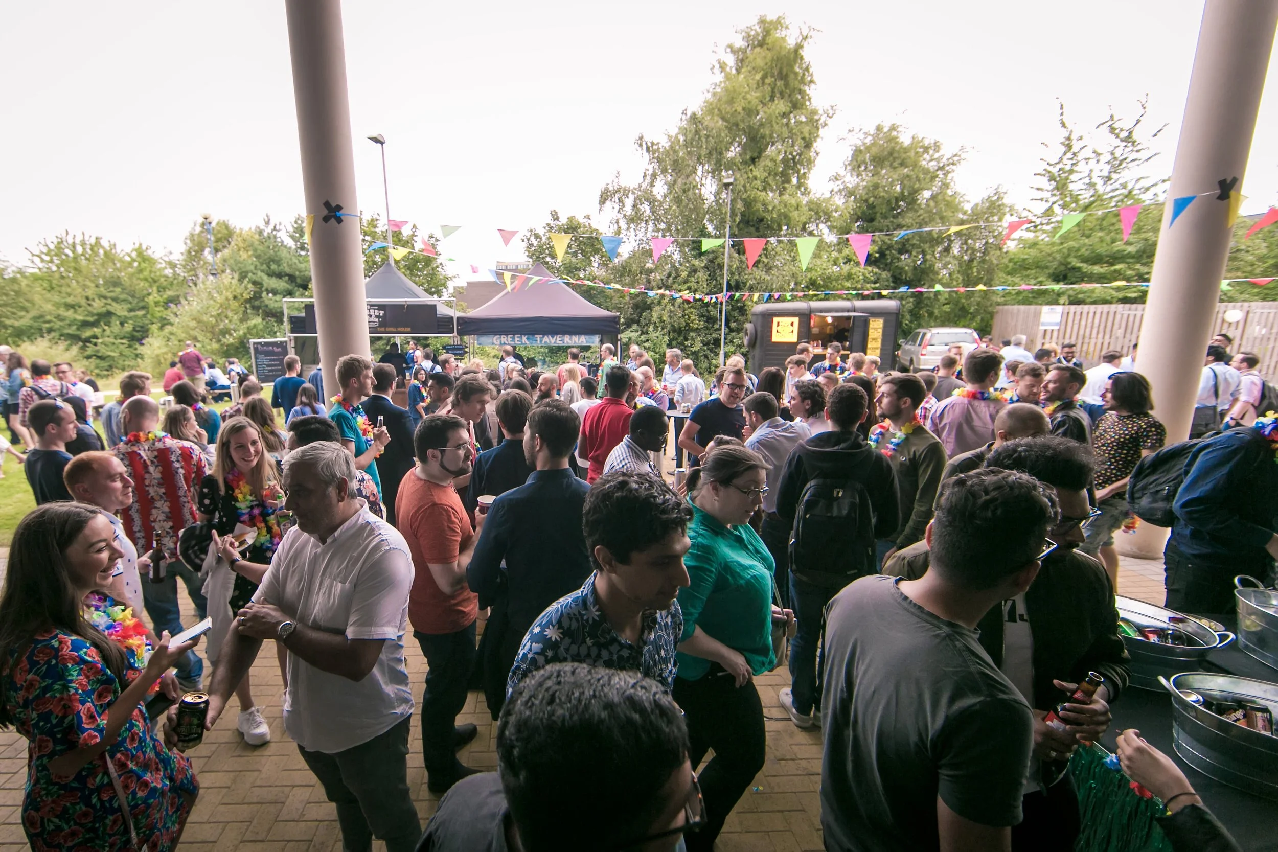 Large crowd attending an outdoor business networking event
