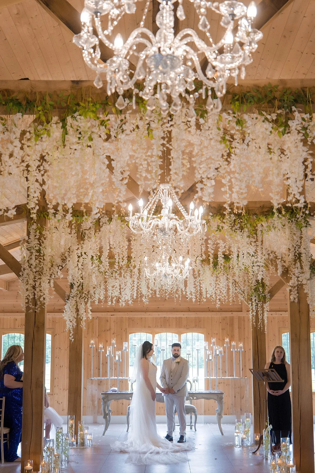 Merrydale Manor wedding ceremony couple at altar with chandelier – wedding photography Cheshire