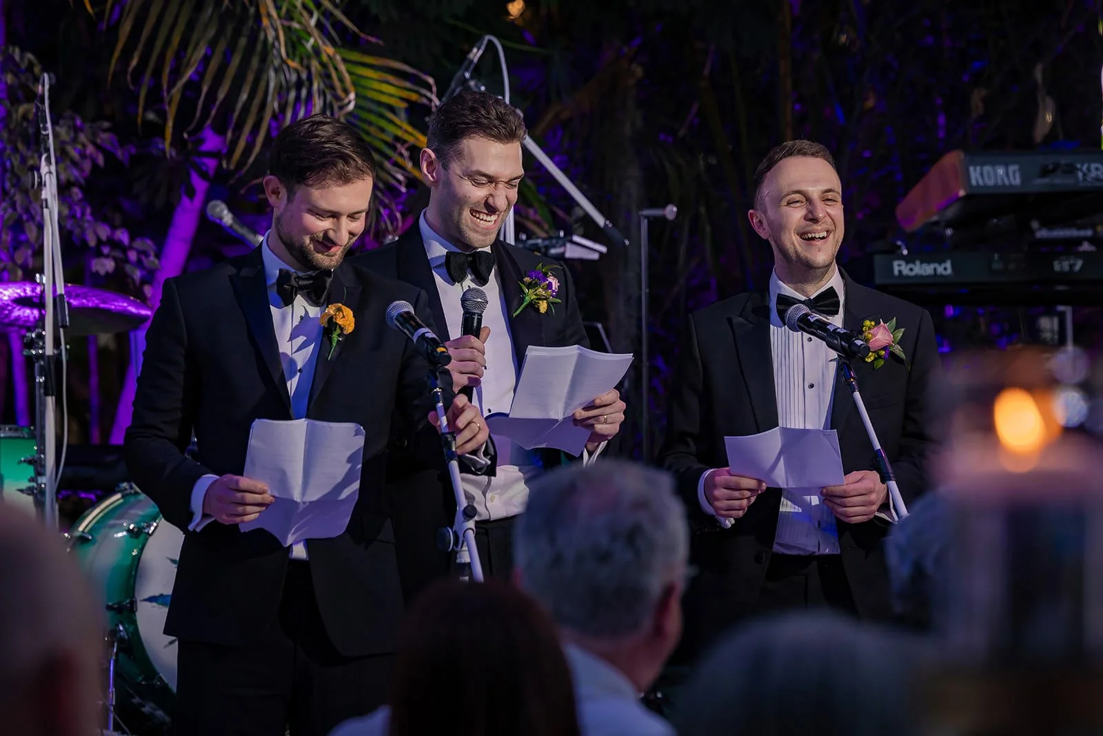 groomsmen speech during wedding reception at sefton park palm house in liverpool
