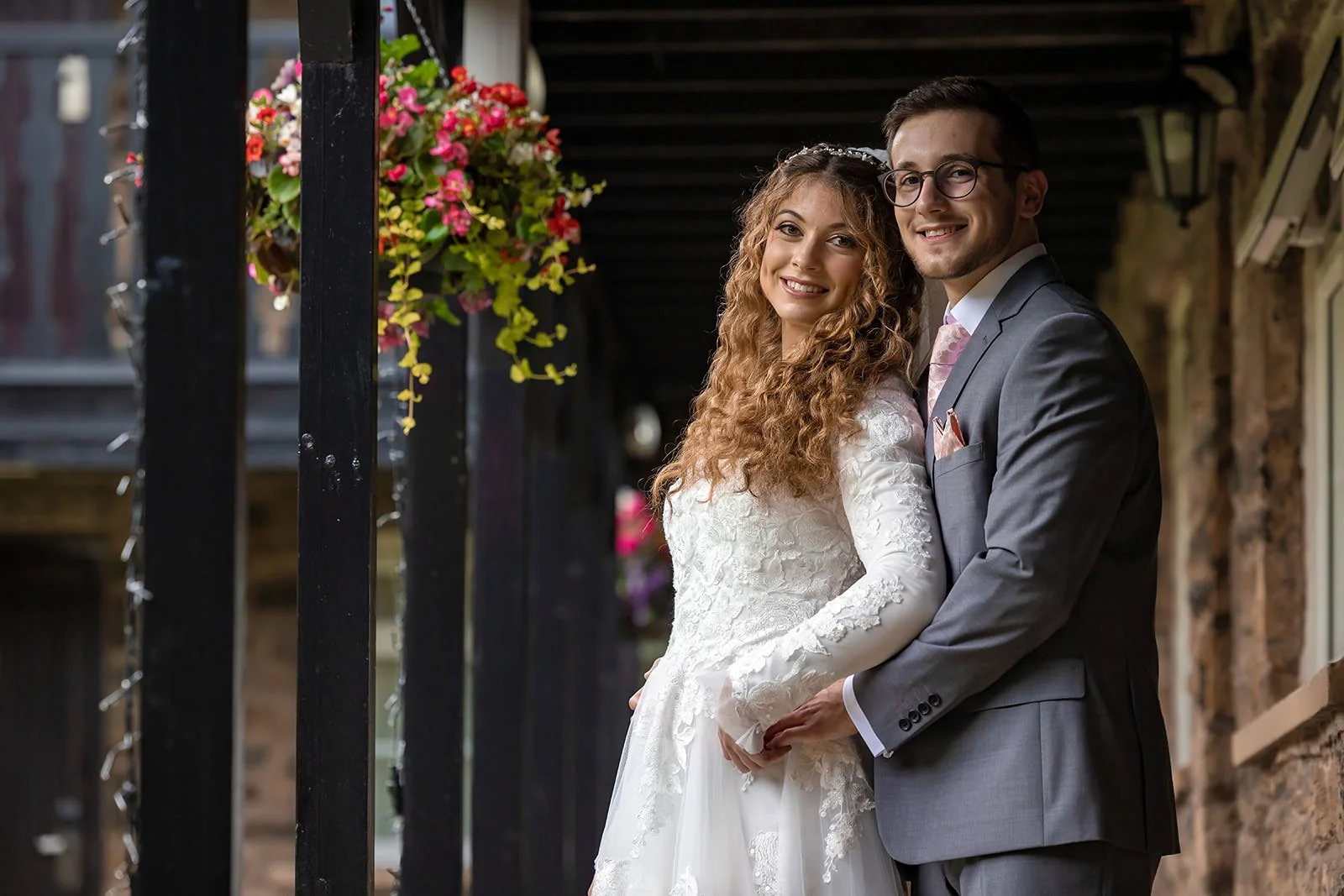 bride and groom newlywed couple portrait at last drop village wedding venue in bolton