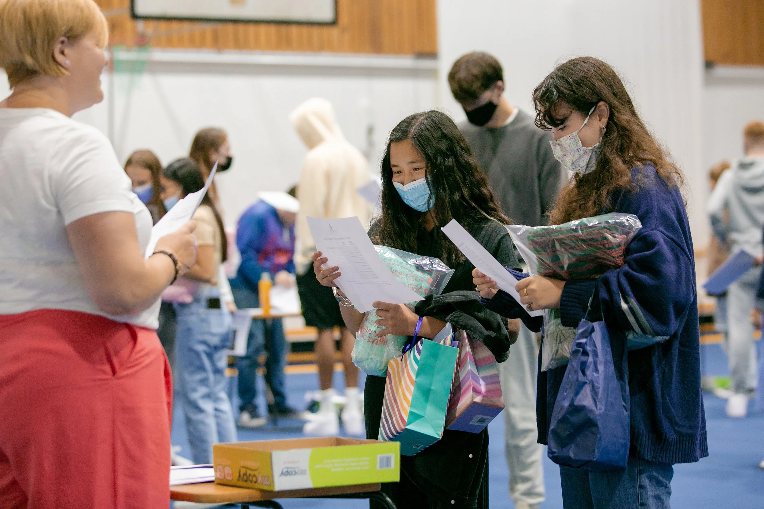 Students checking their GCSE results in Manchester