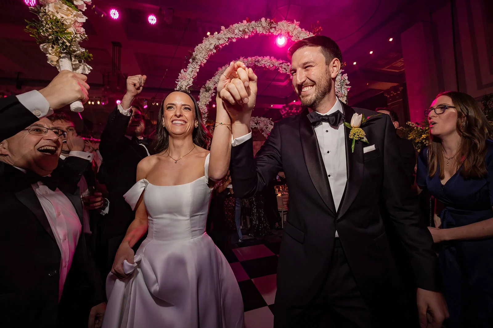 bride and groom enter reception party dancing at kimpton clocktower manchester
