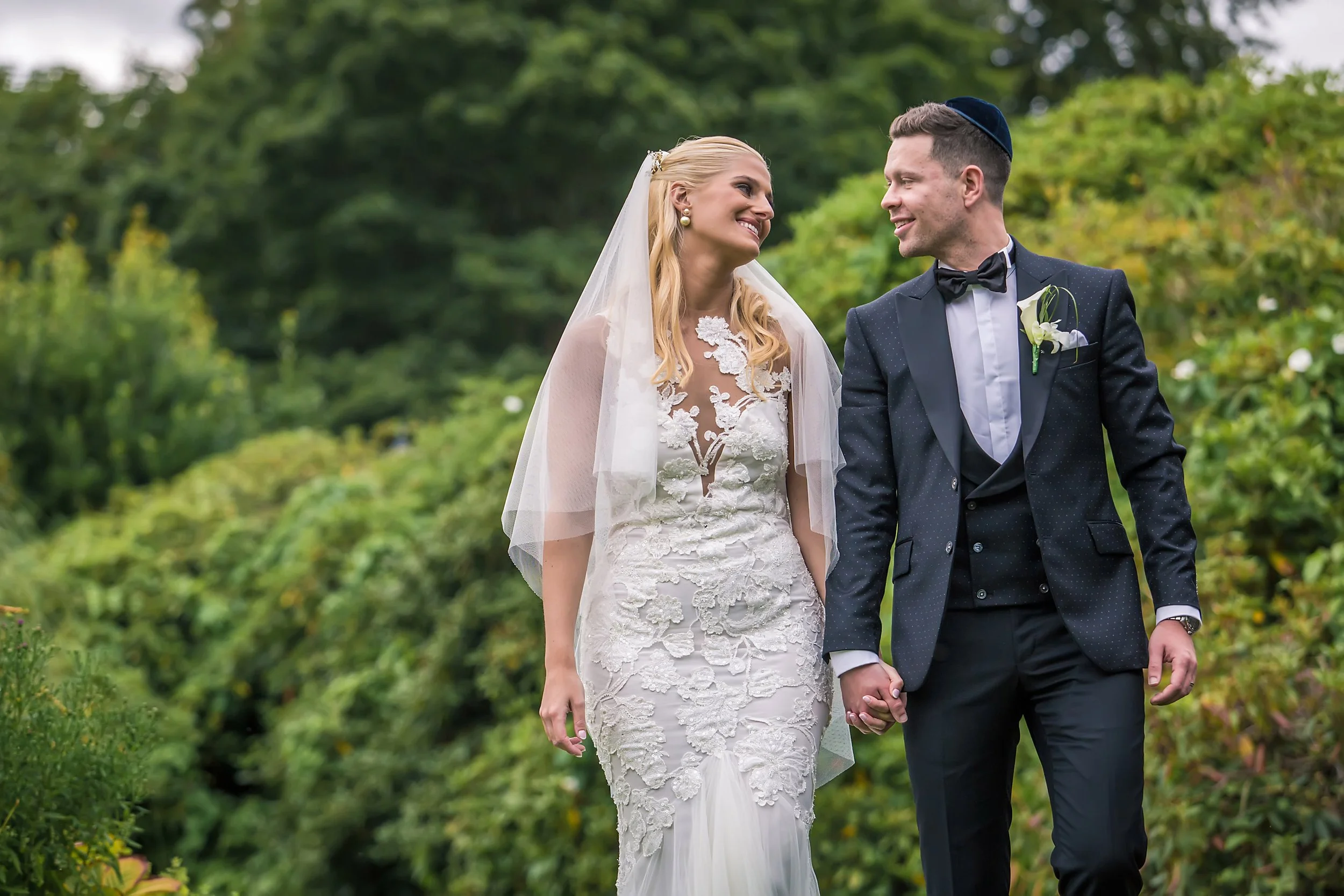 romantic bride and groom newlywed couple portrait at sefton park palm house in liverpool