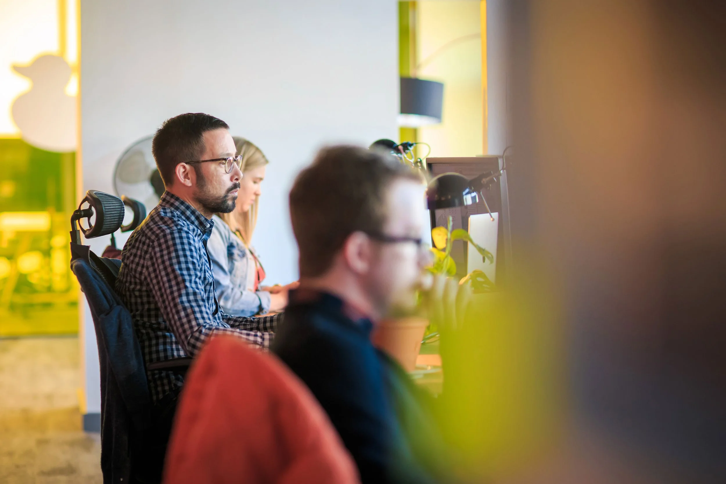 Employees working together in a modern office