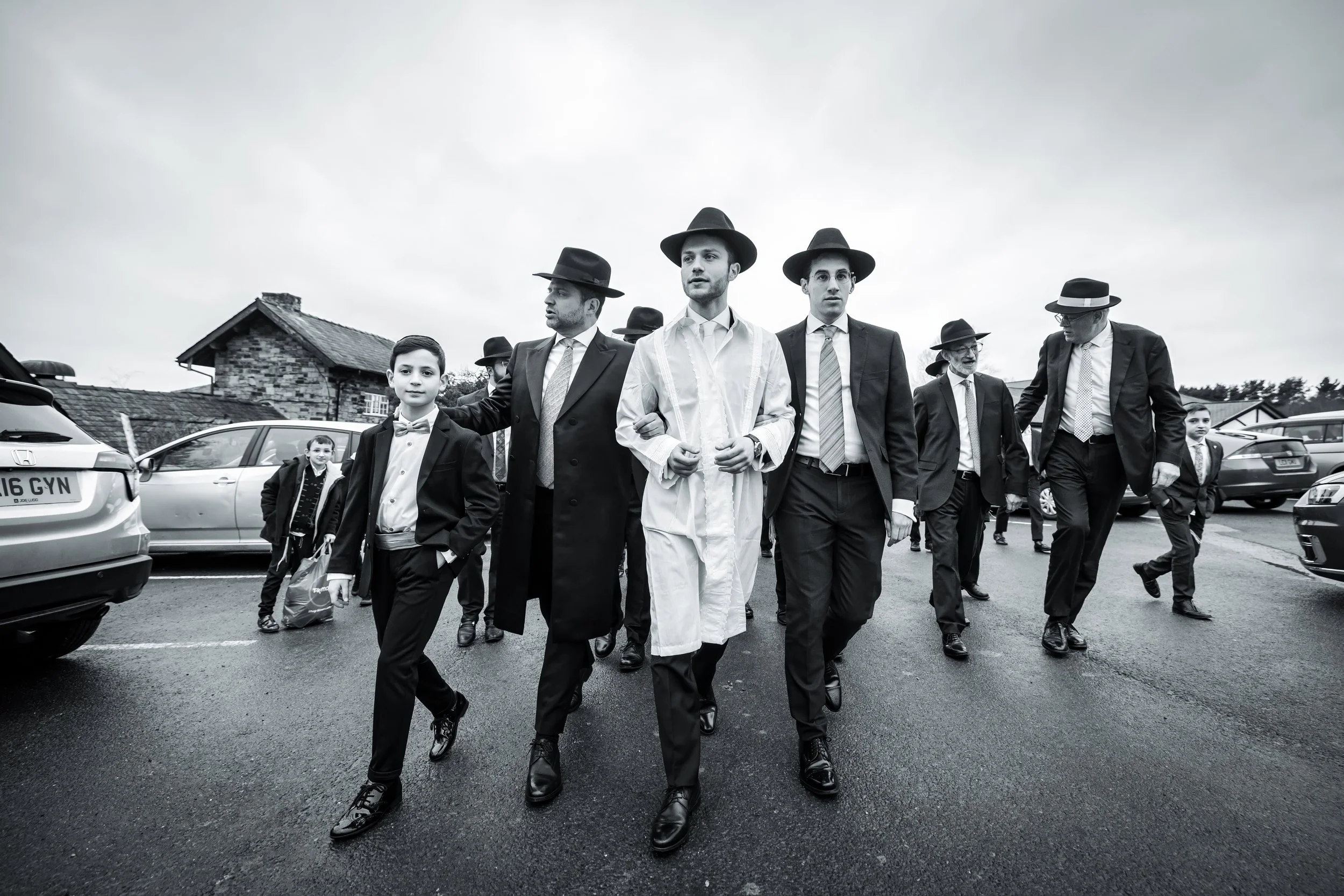 chosson groom walking to bedeken at charedi jewish wedding