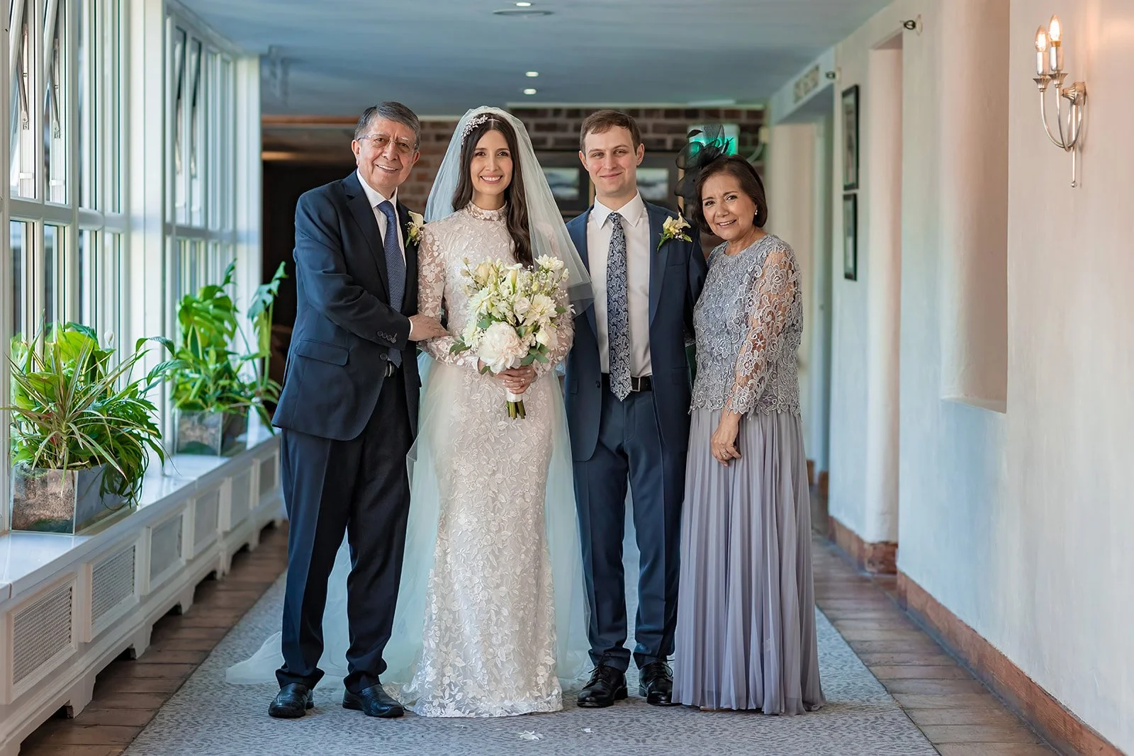 indoor family wedding portrait at worsley marriott hotel