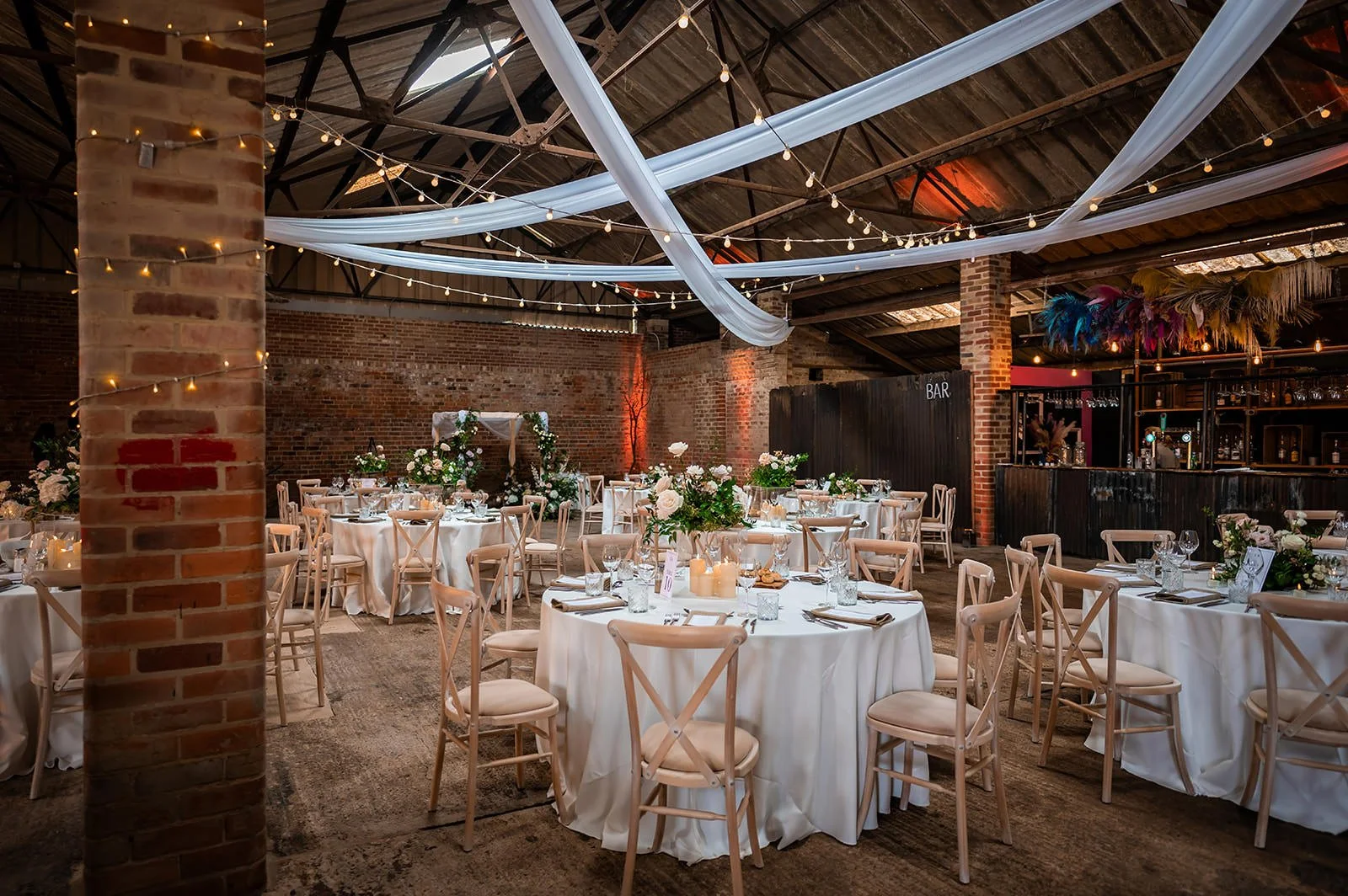 wedding reception dinner set up in wheelhouse at white syke fields in yorkshire