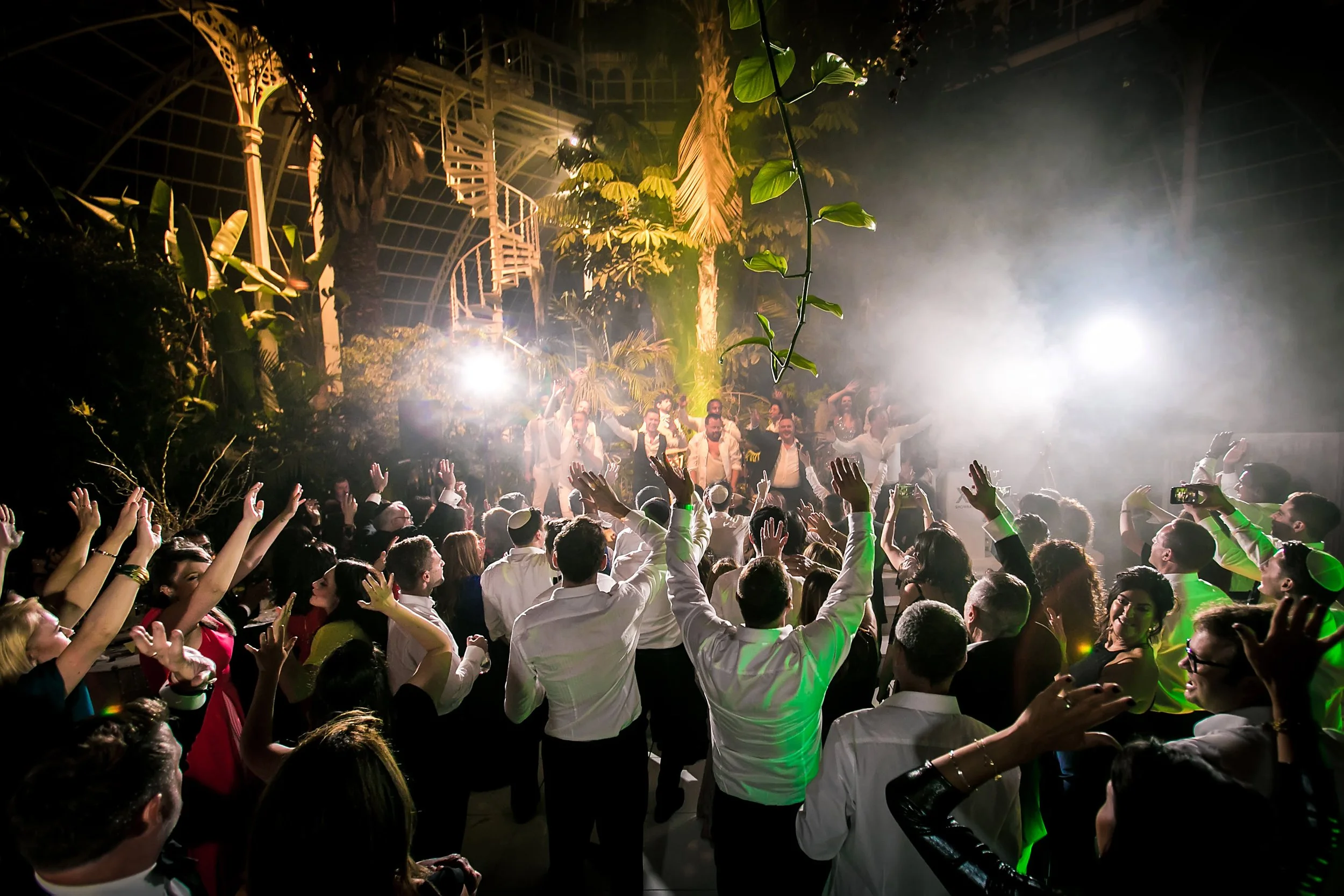 atmospheric wedding reception at sefton park palm house in liverpool