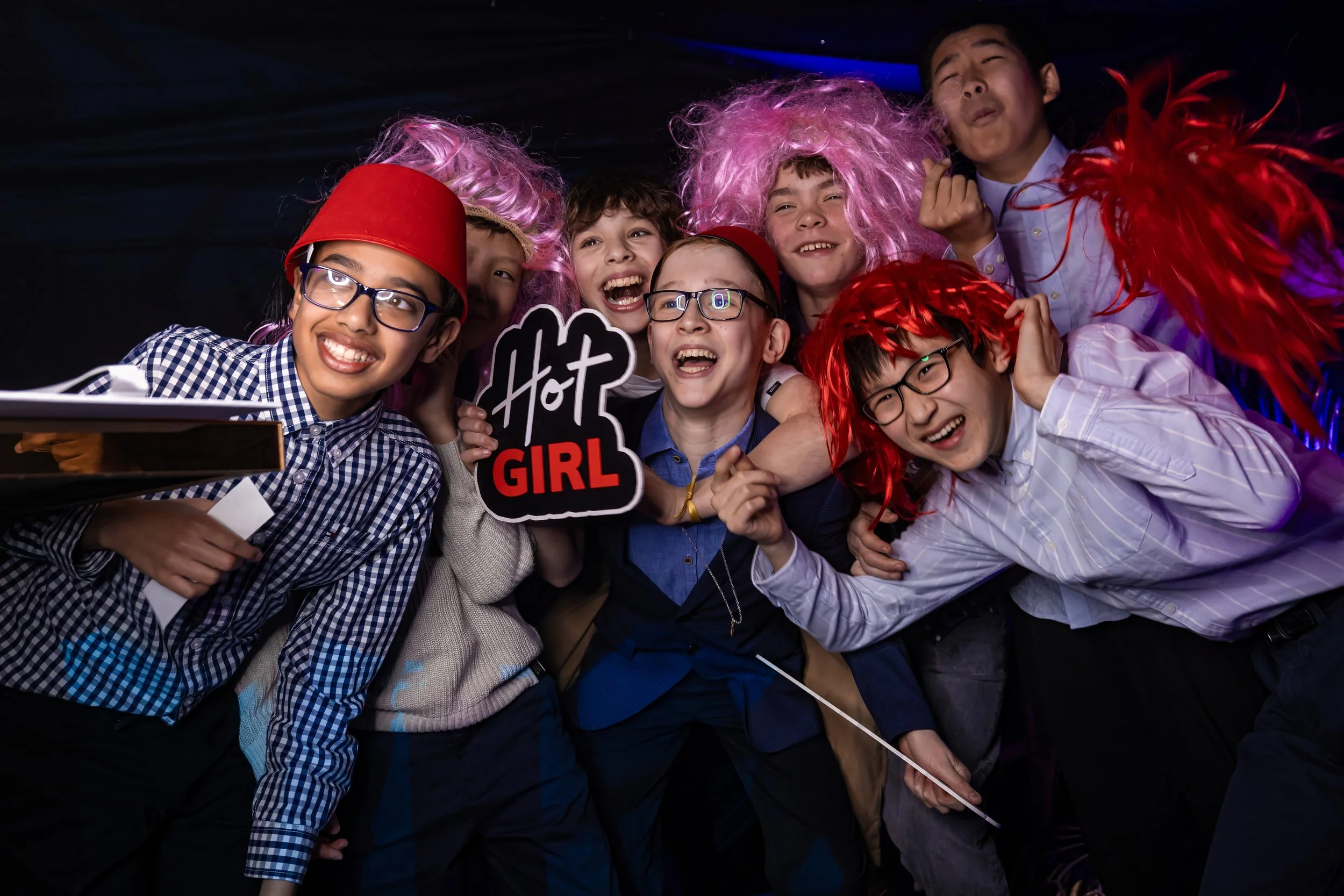 Funny barmitzvah boy and friends pose for silly picture with lots of smiles