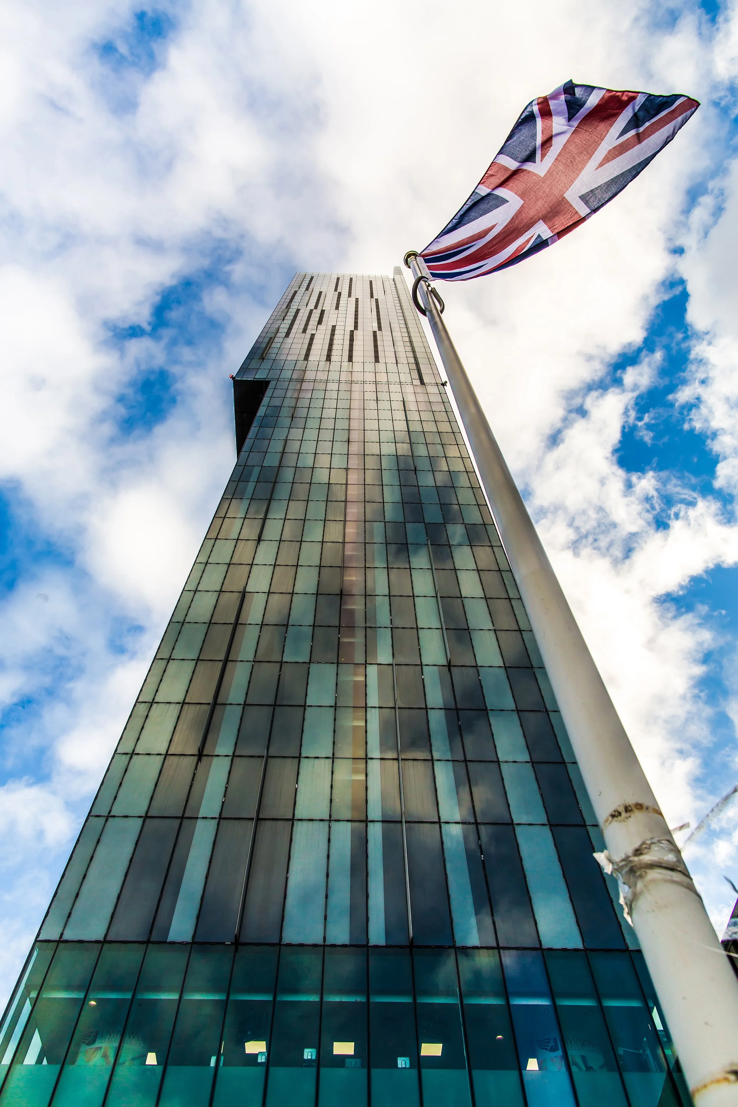 Manchester deansgate hotel wedding venue exterior with flag