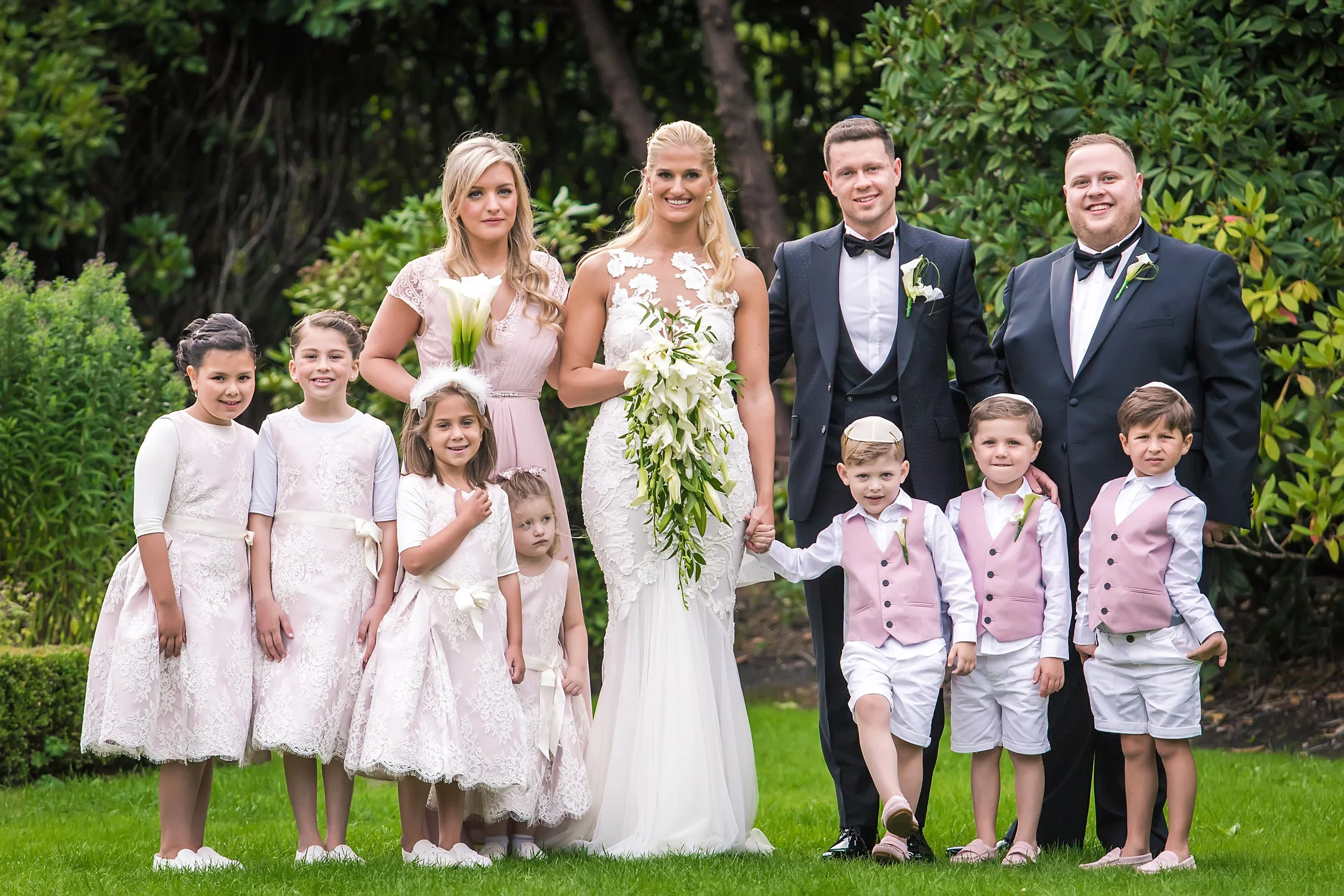 Family portrait at wedding at sefton park palm house