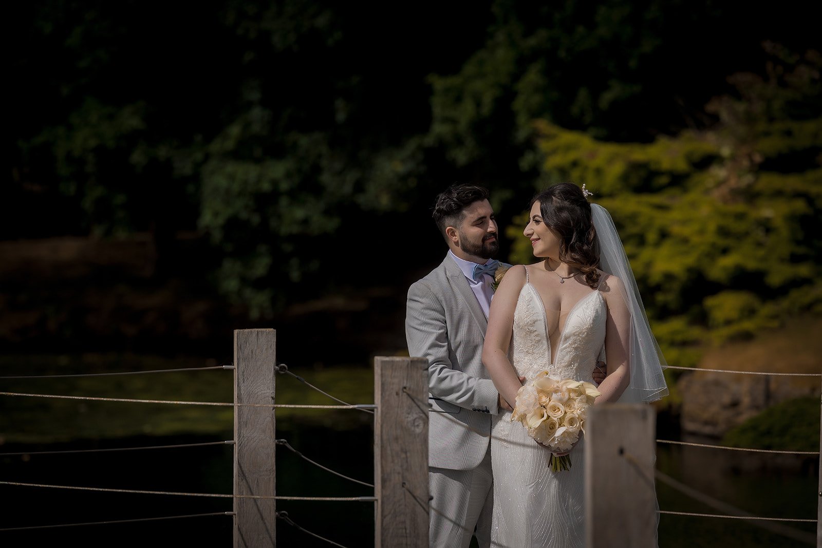 Merrydale Manor wedding couple portrait at night by wooden fence – wedding photography Cheshire