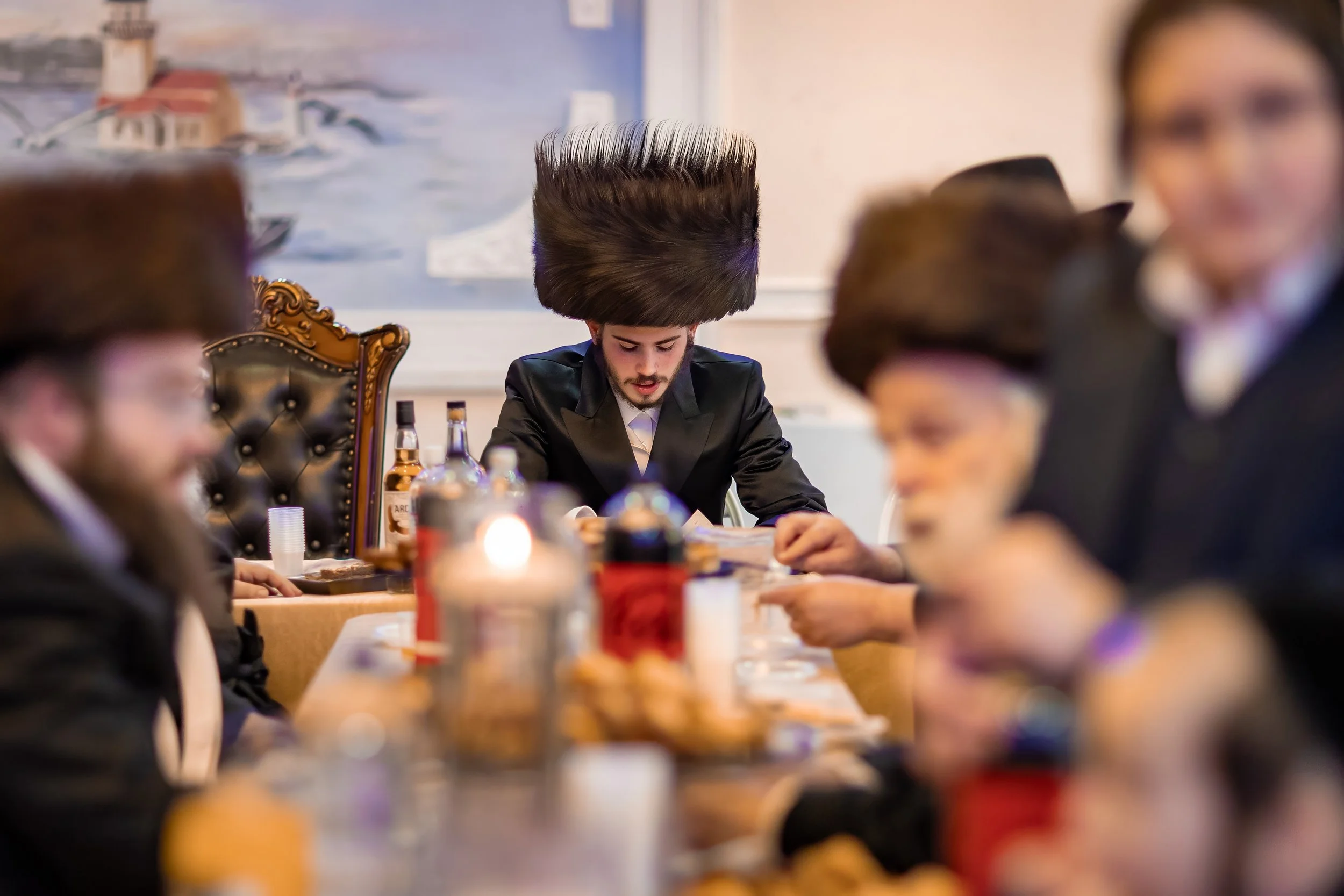chosson groom during tish at charedi jewish wedding