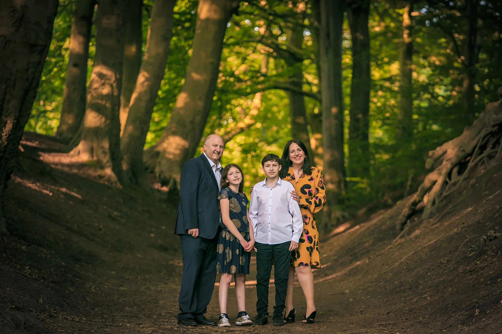 family portrait amongst woodland in prestwich clough