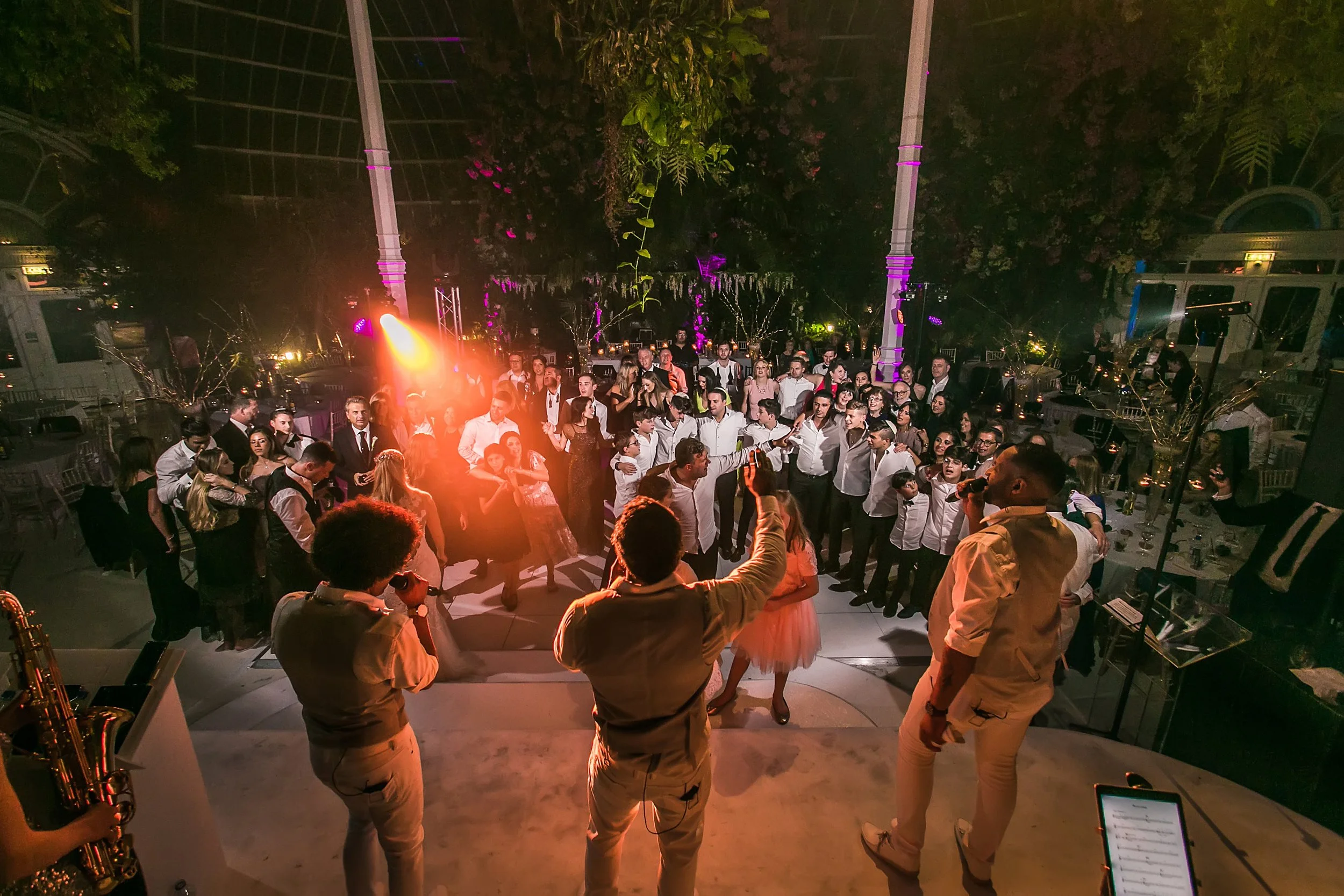 atmospheric wedding reception at sefton park palm house in liverpool