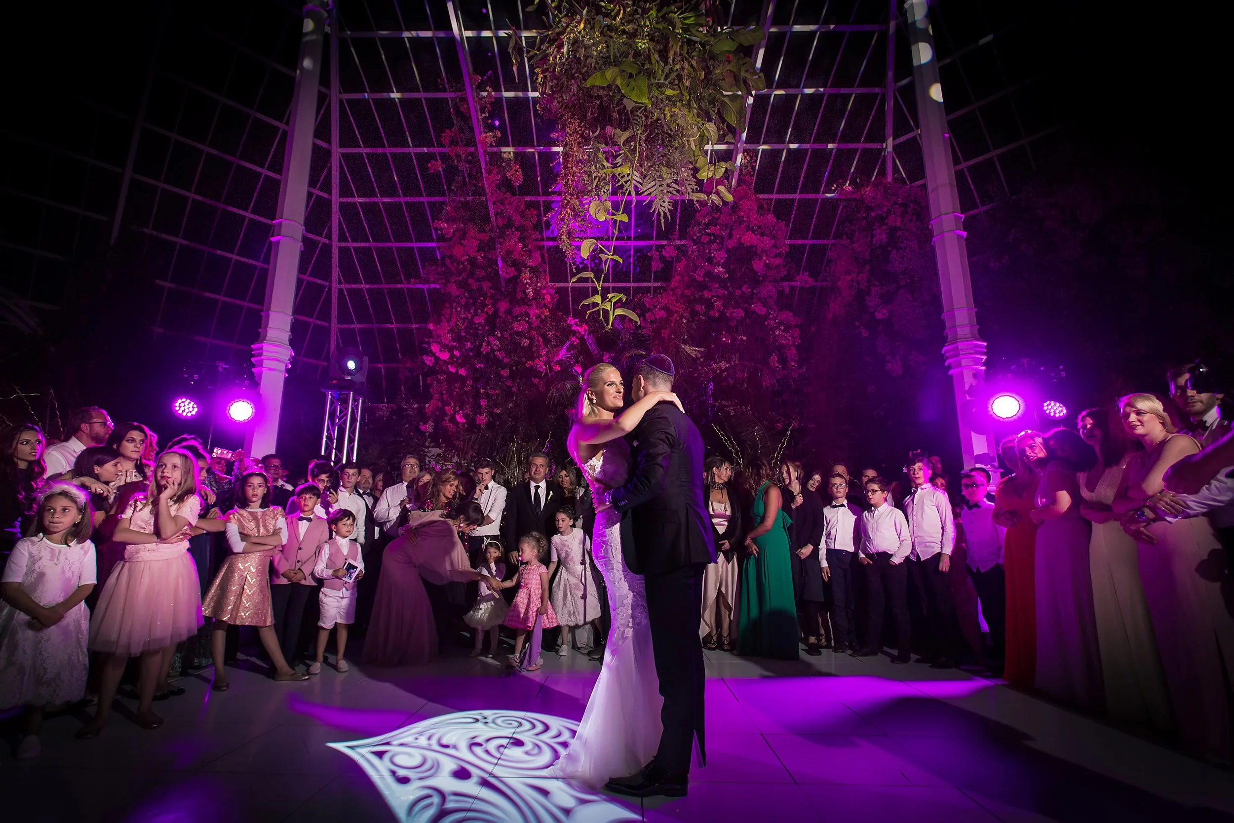bride and groom first dance at wedding reception at sefton park palm house in liverpool