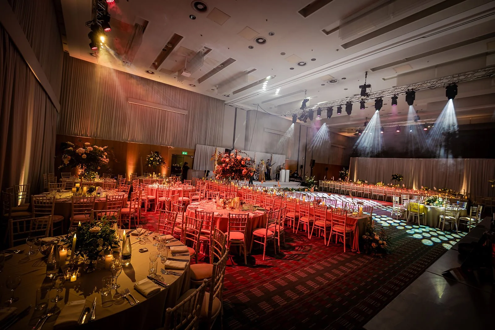 manchester deansgate hotel wedding reception room set up for dinner and dancing with decor and lighting