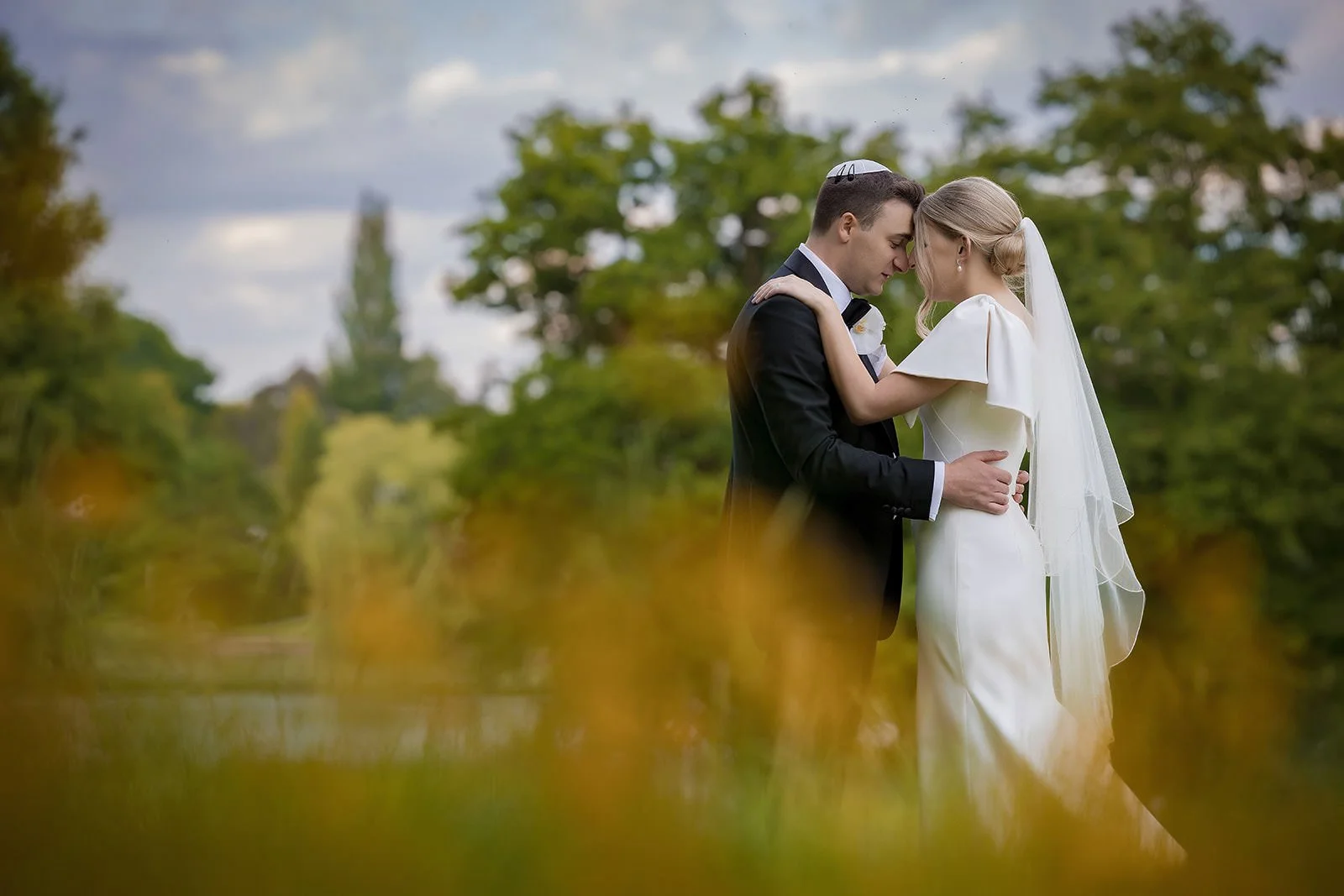 romantic bride groom newlywed couple portrait during wedding at mere golf resort in cheshire