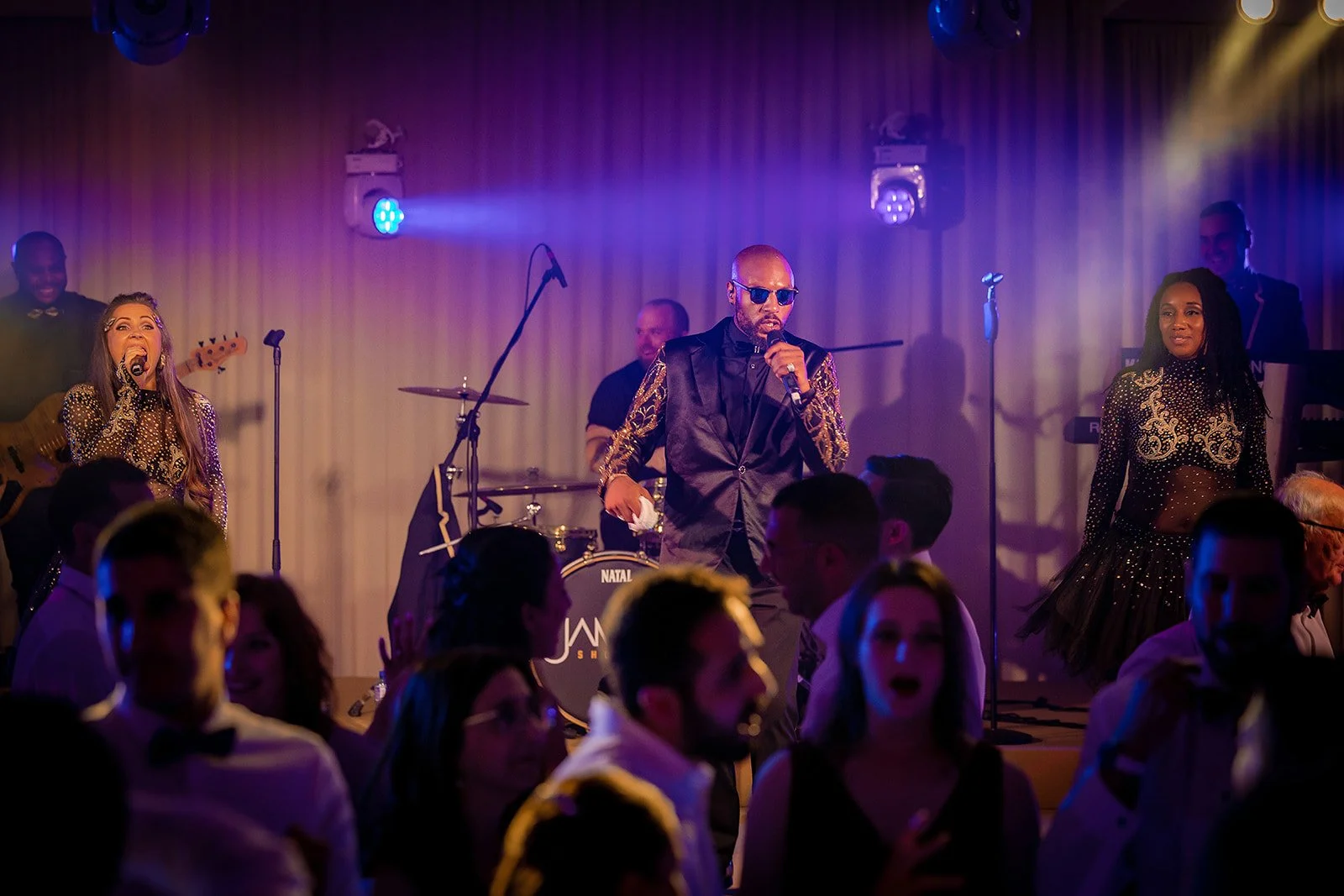 wedding band performing at dancing reception at midland hotel