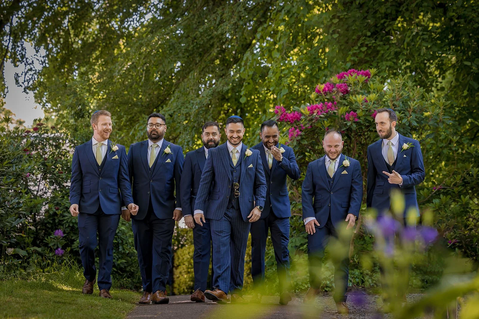 groomsmen portrait outdoors at worsley marriott hotel wedding venue