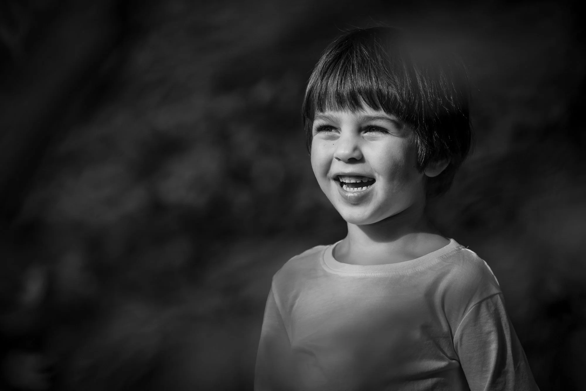 black and white natural light portrait of boy in dunham massey manchester