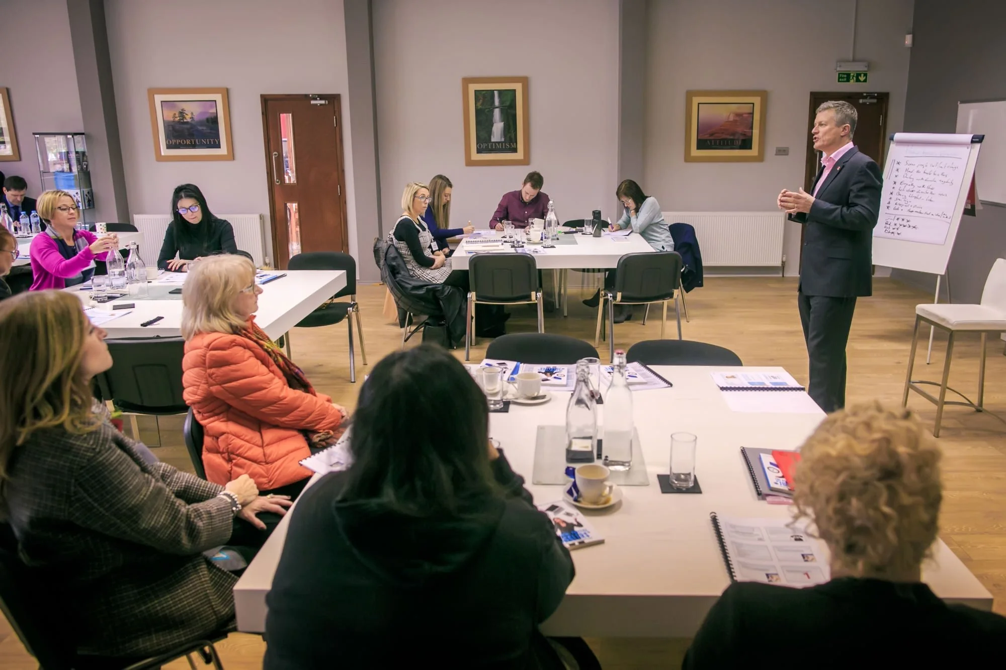Attendees taking part in a business workshop and discussion session