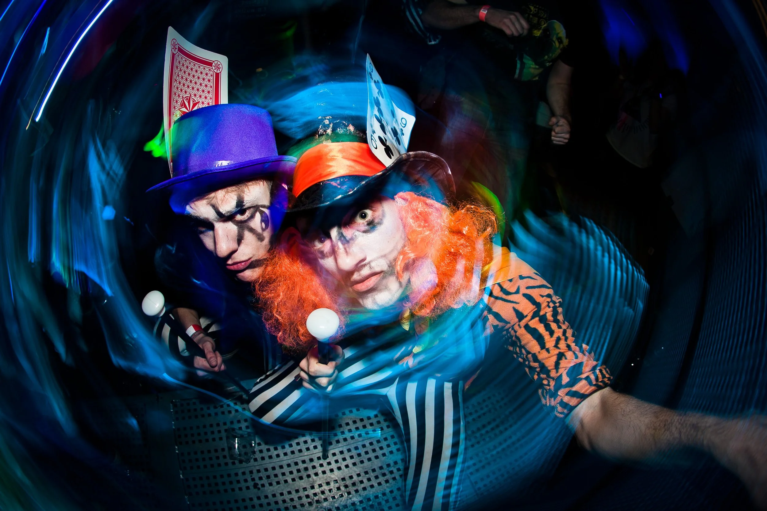 jokers in fancy dress at illuminaughty party in nightclub