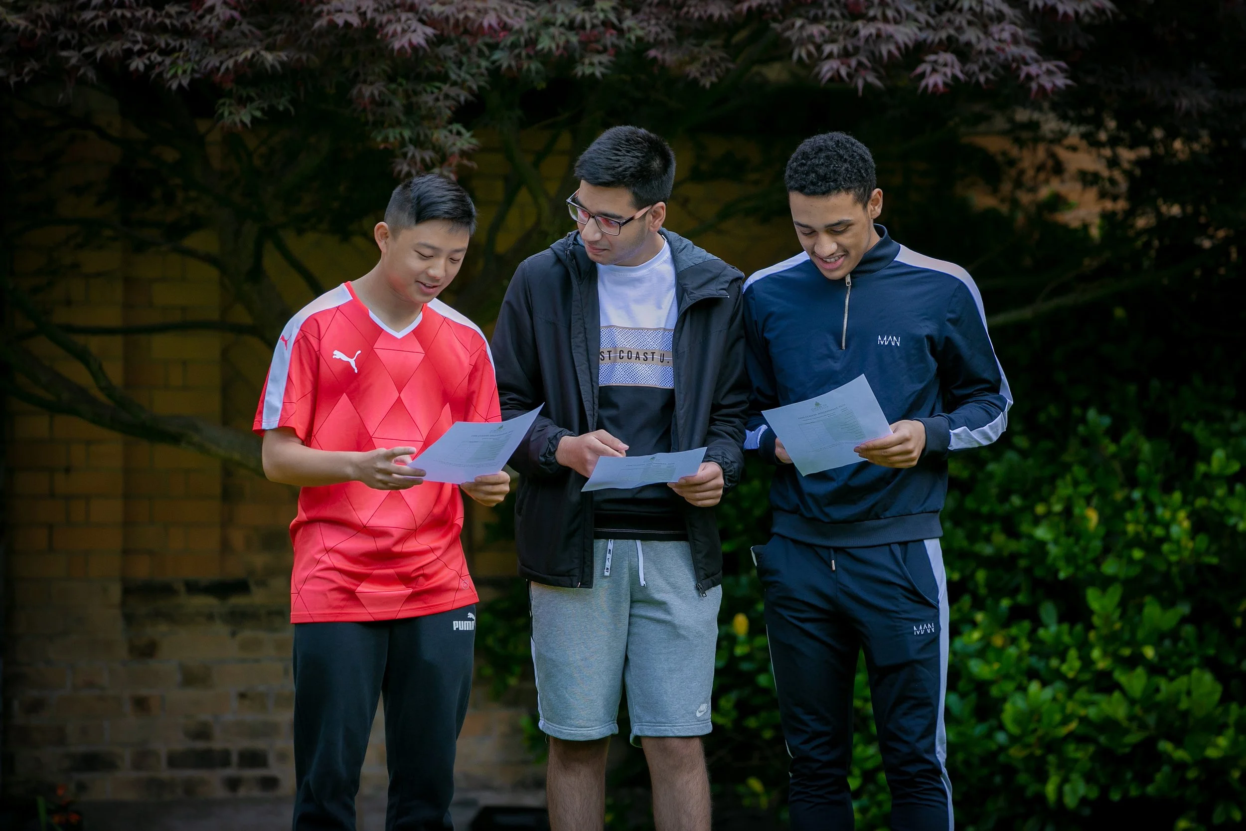 Students checking their GCSE results in Manchester