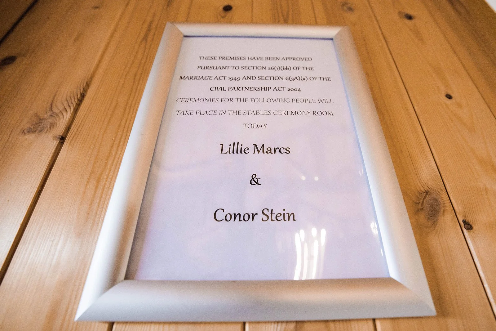 Merrydale Manor wedding marriage certificate framed on wooden table – fine art wedding photographer North West
