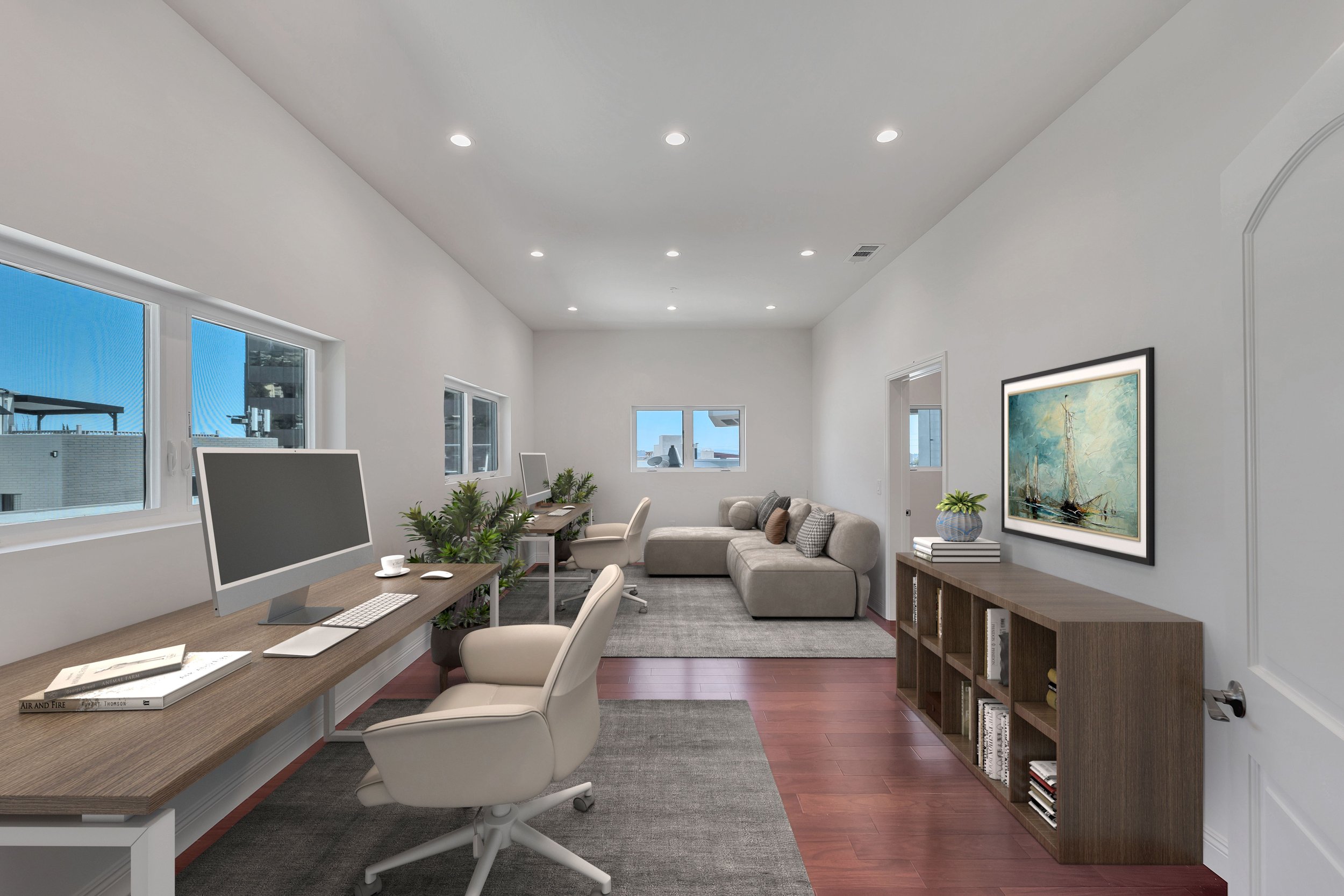 Modern home office and living room with large windows, wooden furniture, computer, books, plants, artwork, white walls, and hardwood floors.