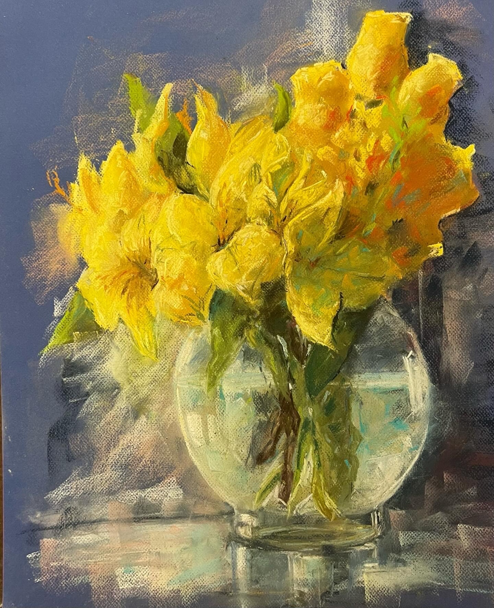 A pastel still life of yellow daffodils in a glass bowl