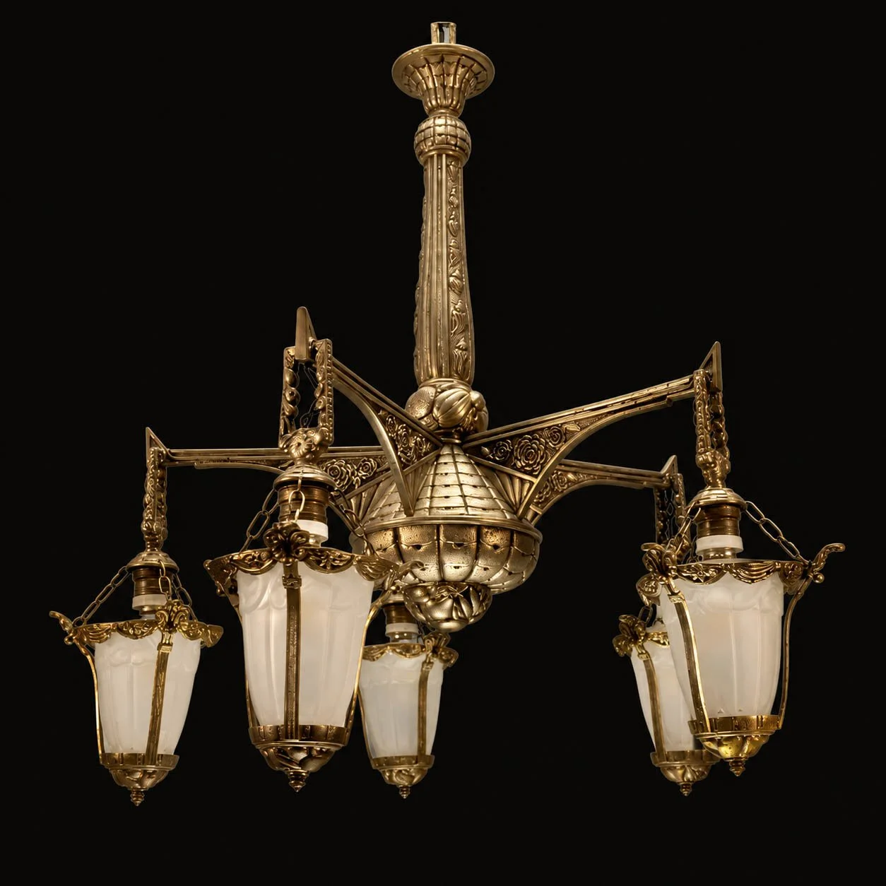 A five-light Art Deco chandelier in cast brass, hung with frosted glass lantern shades and finished with rose and shell detail along the arms. A dramatic anchor piece for a moody entryway ceiling.