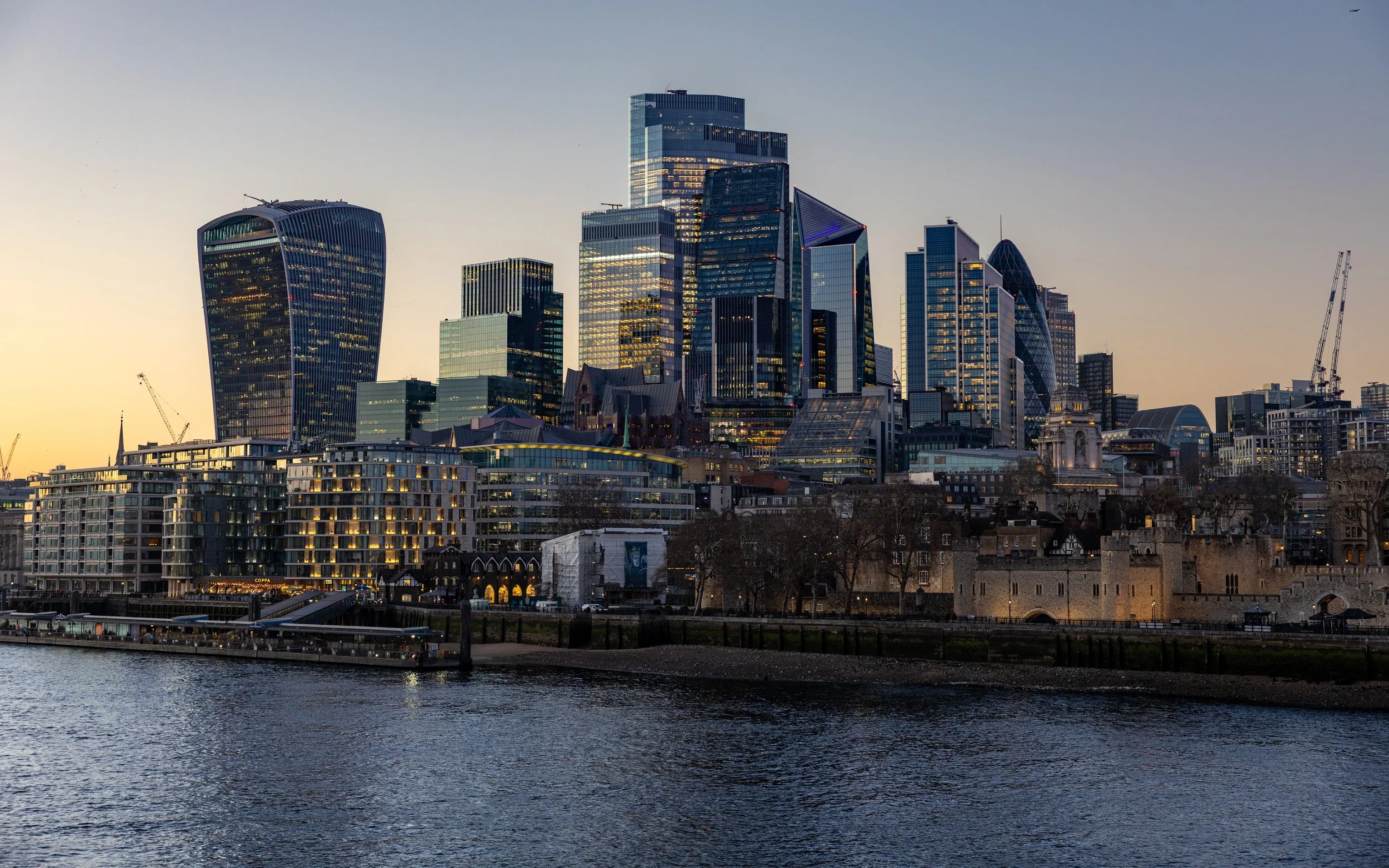 Skyscrapers in London viewed from across the river at sunset.
Taken in London