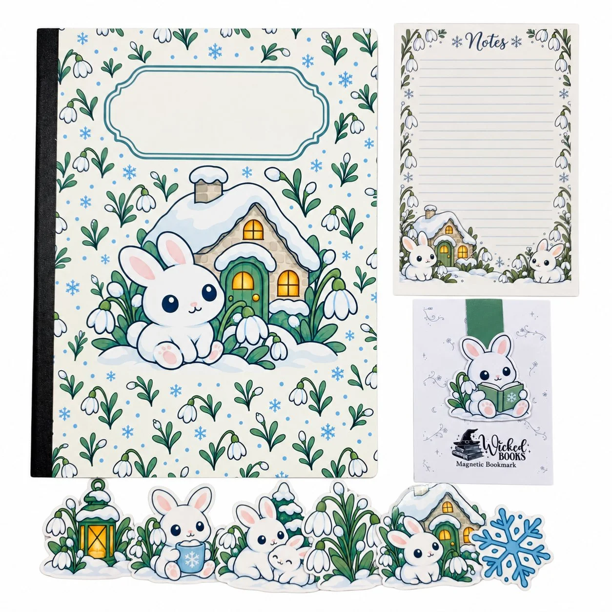 Snowy cottage and white rabbit note set with a composition notebook, matching notepad, magnetic bookmark, and six coordinating stickers on a white background.