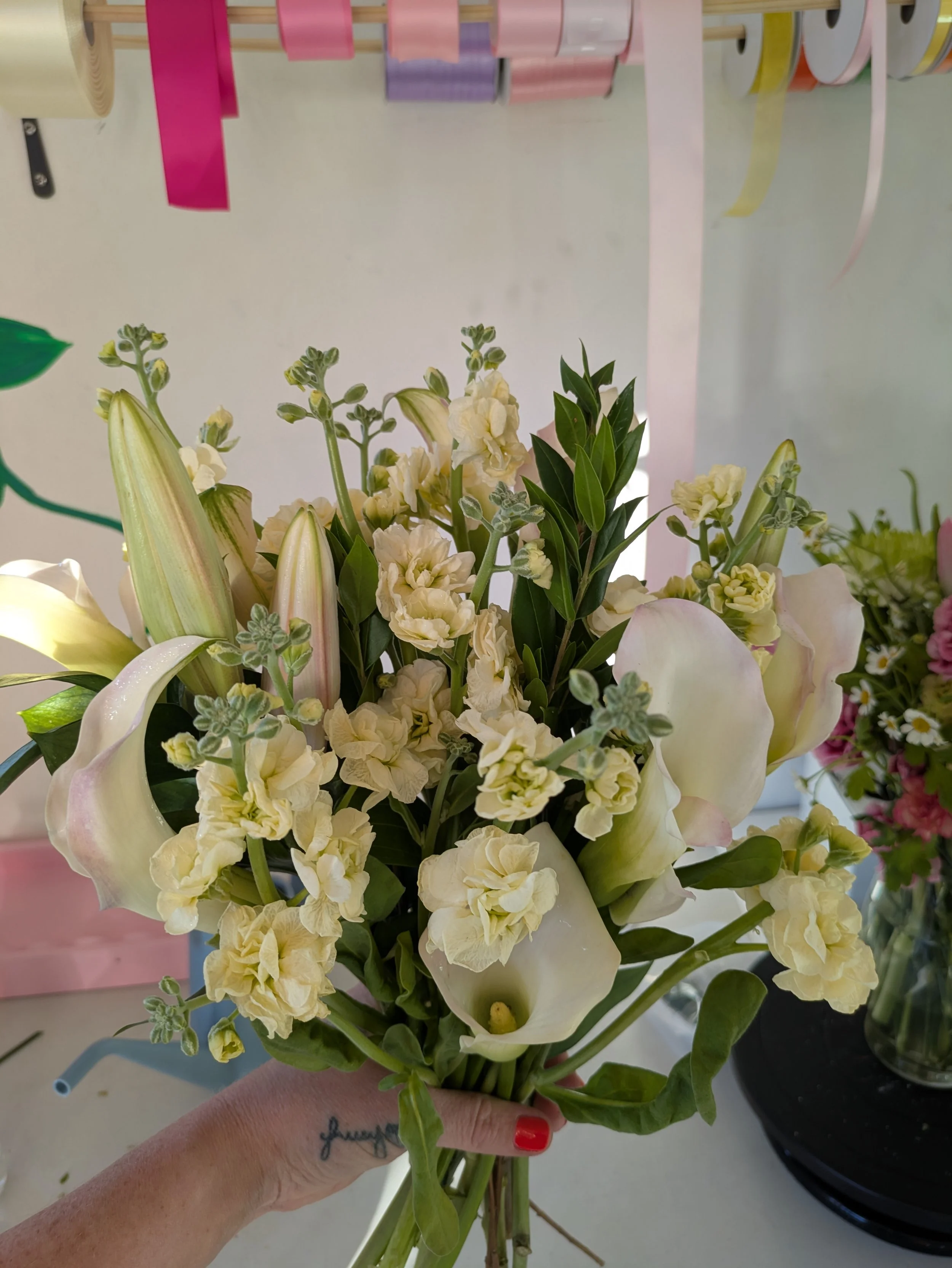 hand held white lilly.jpg