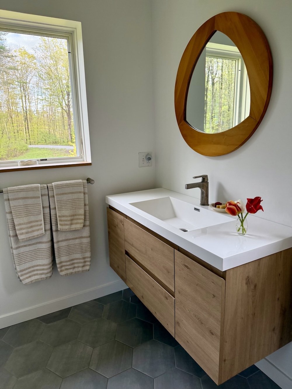 Custom bathroom vanity in mid-century modern home addition in Arlington, Vermont