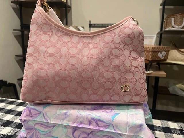 Elegant Pink Shoulder Bag with Logo Pattern