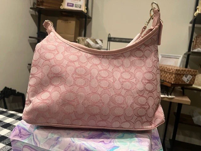 pink coach charm.jpg