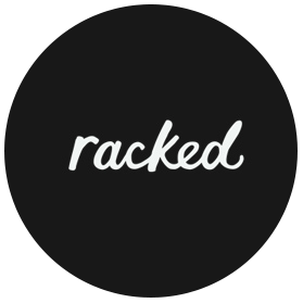Logo with the word "racked" in white script on a black background.