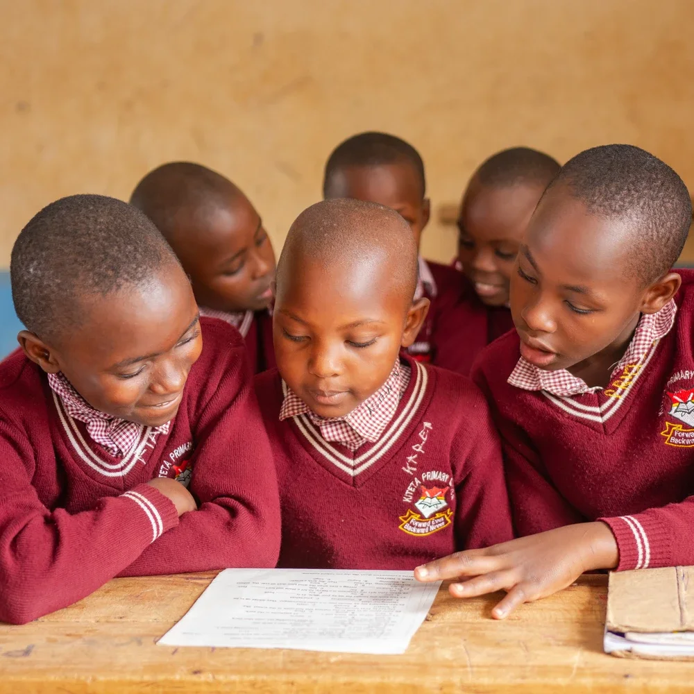 Kiteta primary school students working together on a class activity.