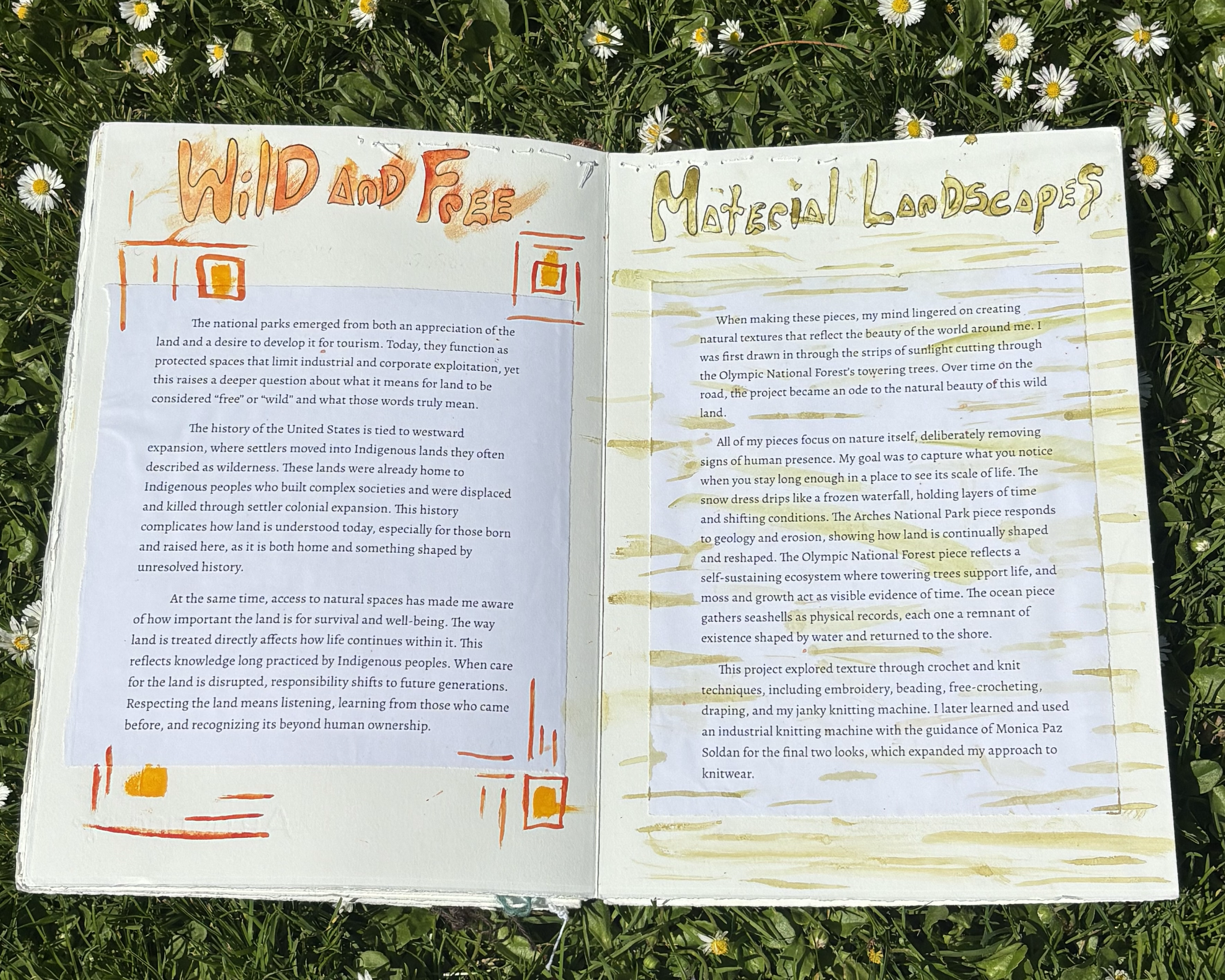 Open notebook on grass with botanical illustrations and handwritten notes about wild and free landscapes and natural textures.