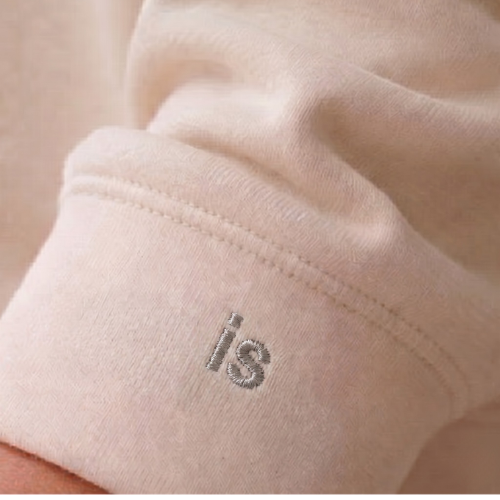 <img source='pic.gif' alt='Close-up of the is sweatshirt cuff showing subtle embroidery for the Human & Co. reset ritual'/>