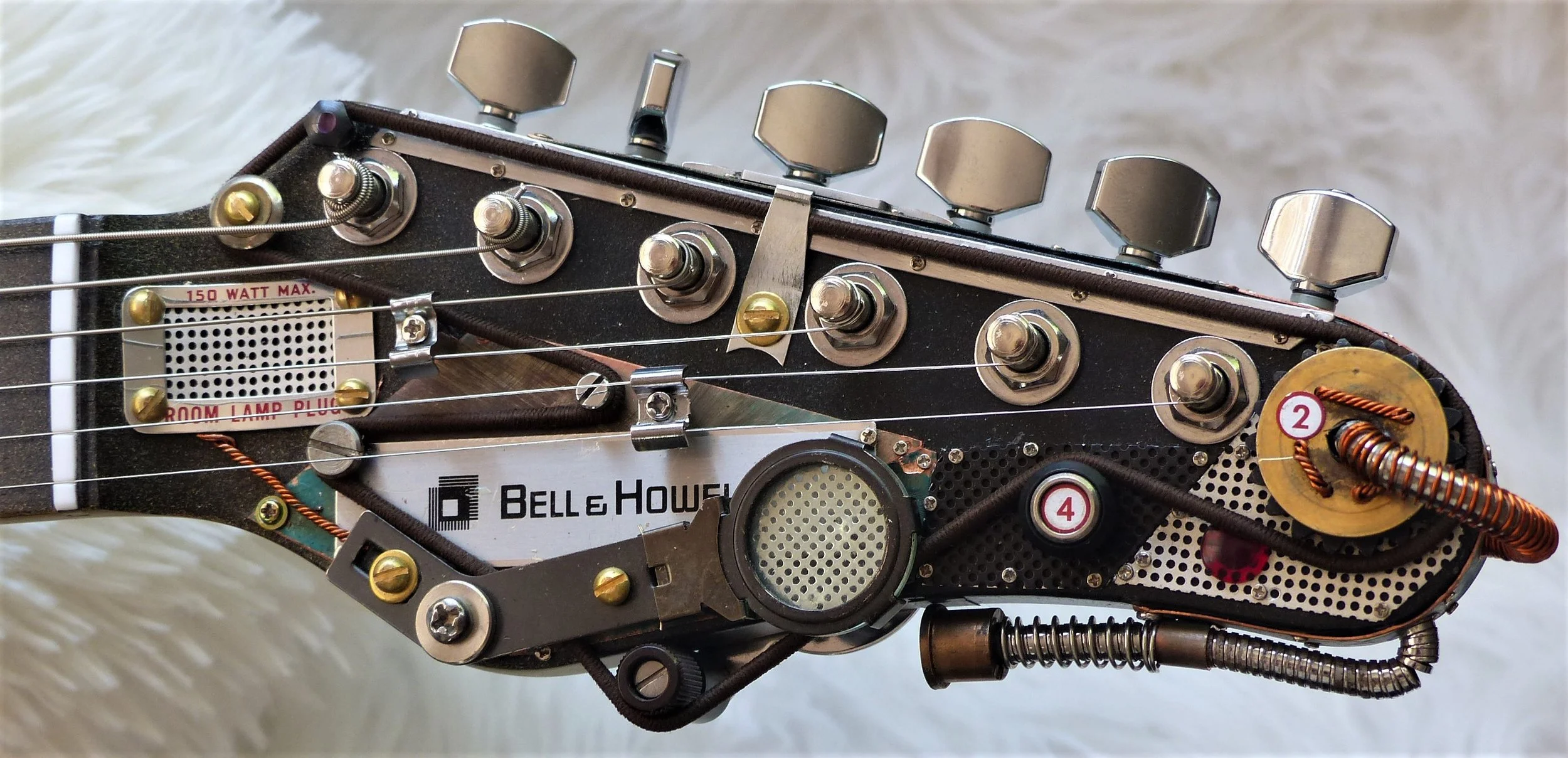 Bell & Howell autoload gold headstock 2.jpg