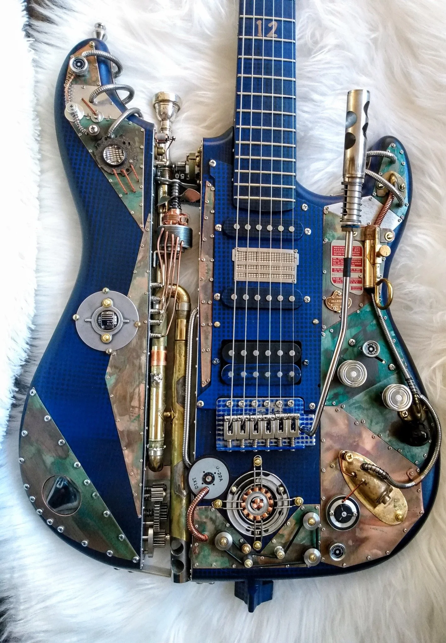 Blue DuJur Steampunk Guitar, Mike Moulton, luthier, Immortal Guitars, made from vintage 8mm projector parts, lenses, labels, trumpet parts, lyre