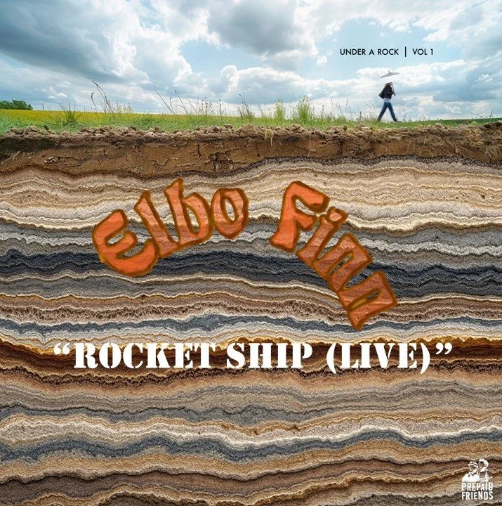 Cross-section of layered rocks under a cloudy sky, with a person walking on a grassy field holding an umbrella, and text indicating a music album titled 'Under a Rock VOL 1' and 'eubo Flying' with the subtitle 'ROCKET SHIP (LIVE)'.