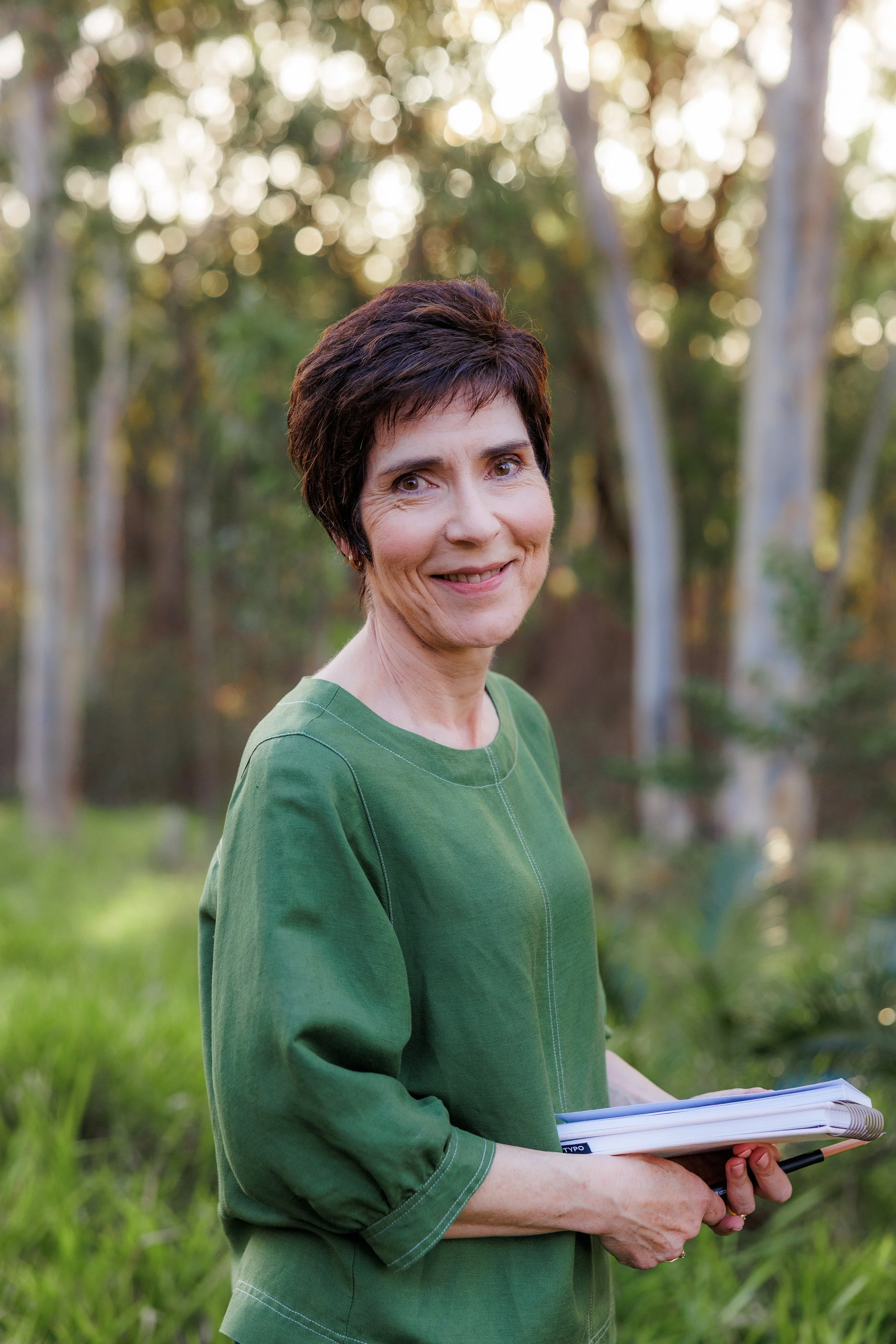 Barbara Ann, surface pattern designer behind Flourish & Bloom Designs, outdoors in North Queensland.