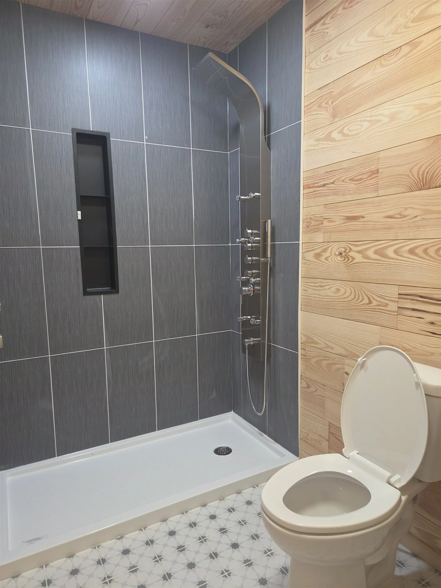 The Beaver Den Cabin tiled walk-in shower