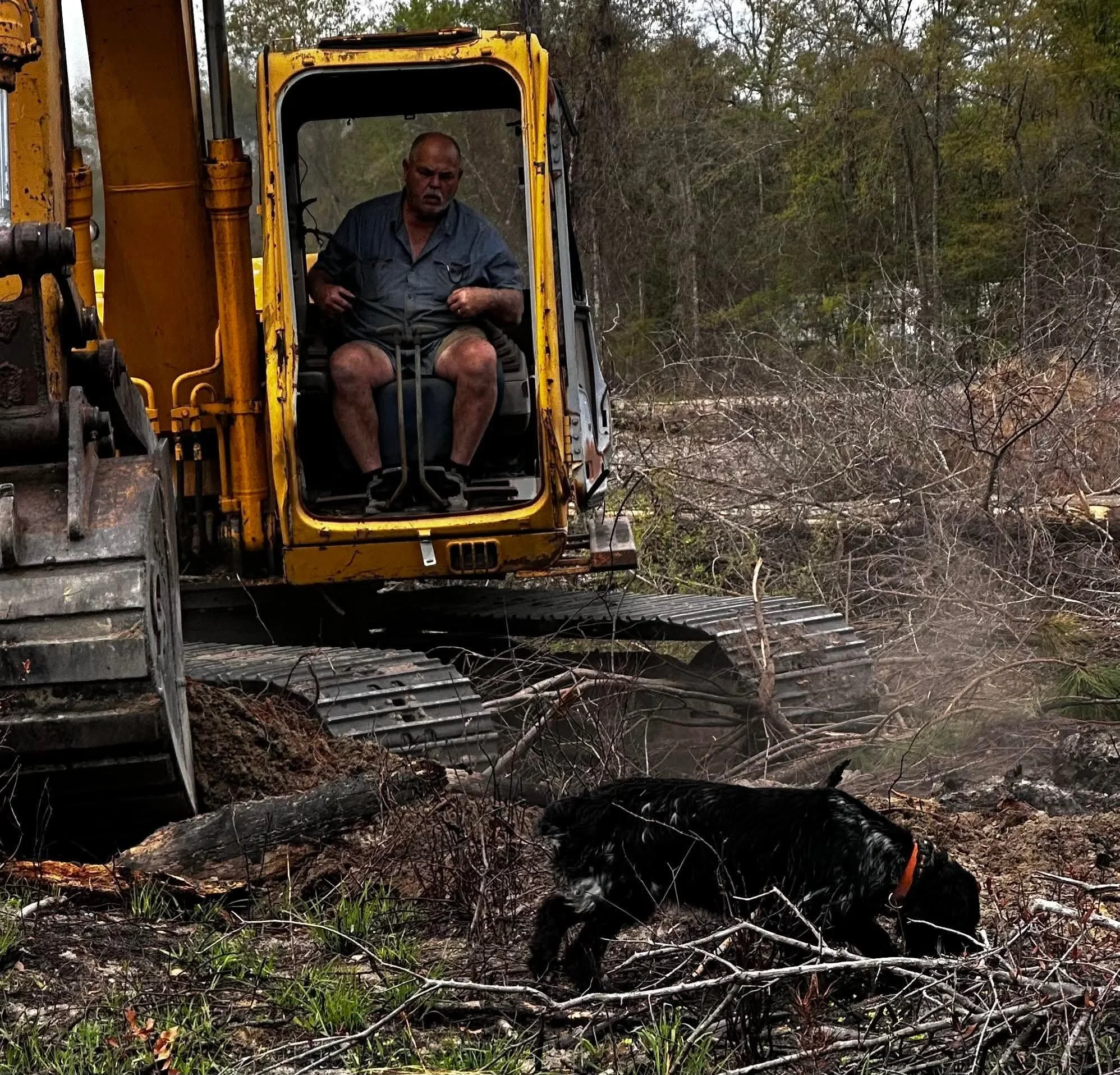 Mr. Billy working hard to clean up debris from the storm.