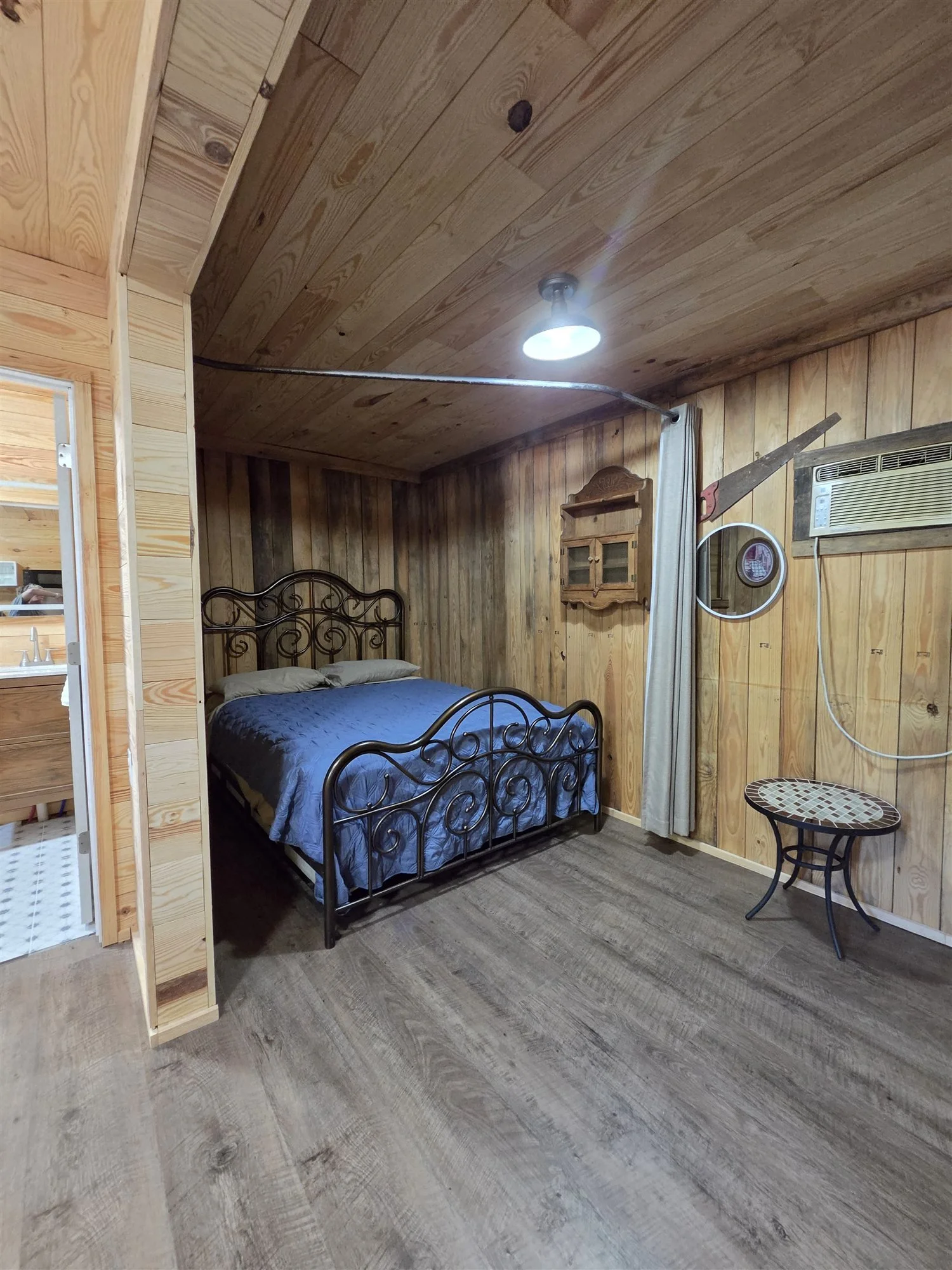 The Beaver Den Cabin queen bed (remodeled)